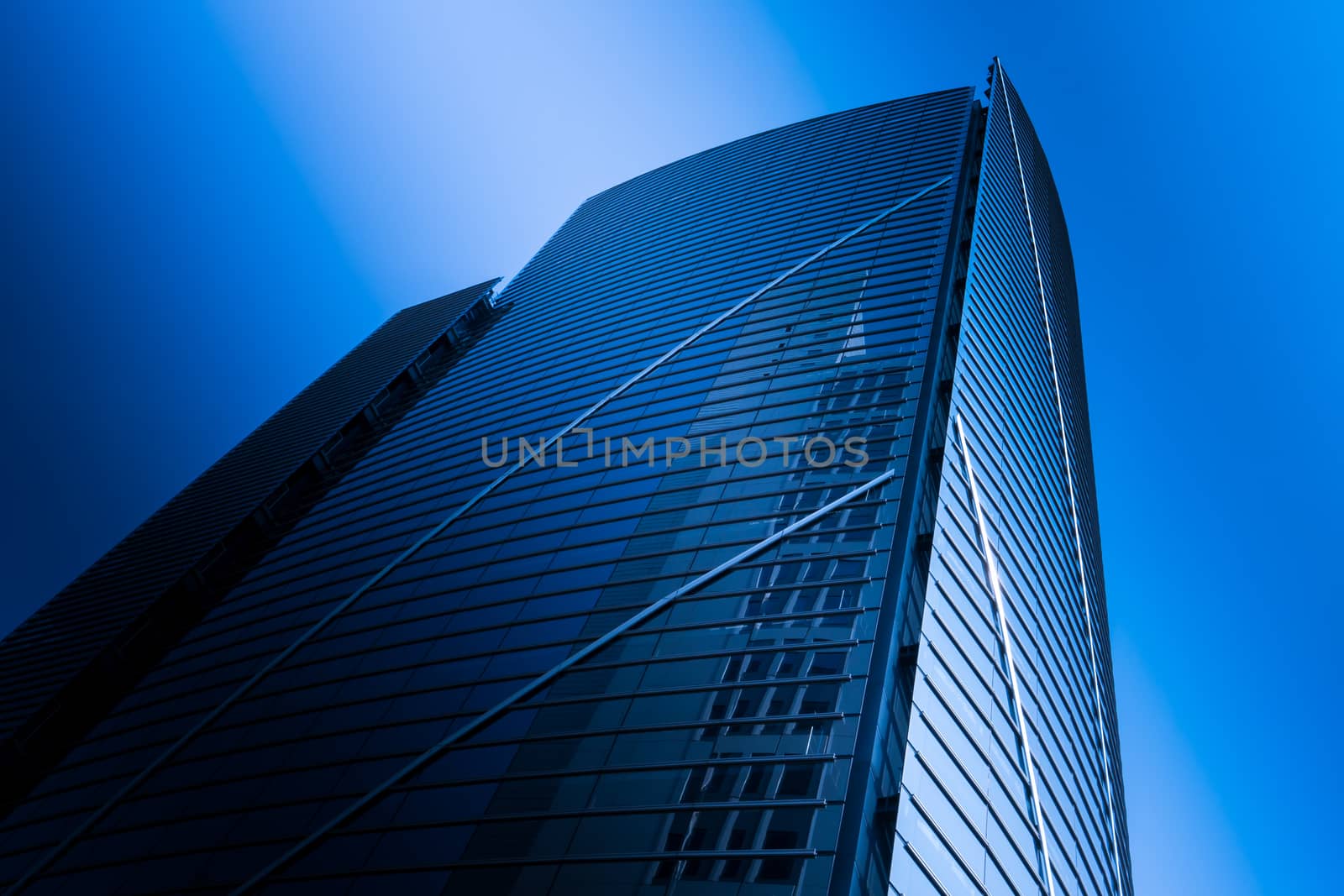 Photo of modern building in business area of Bangkok under clear sky