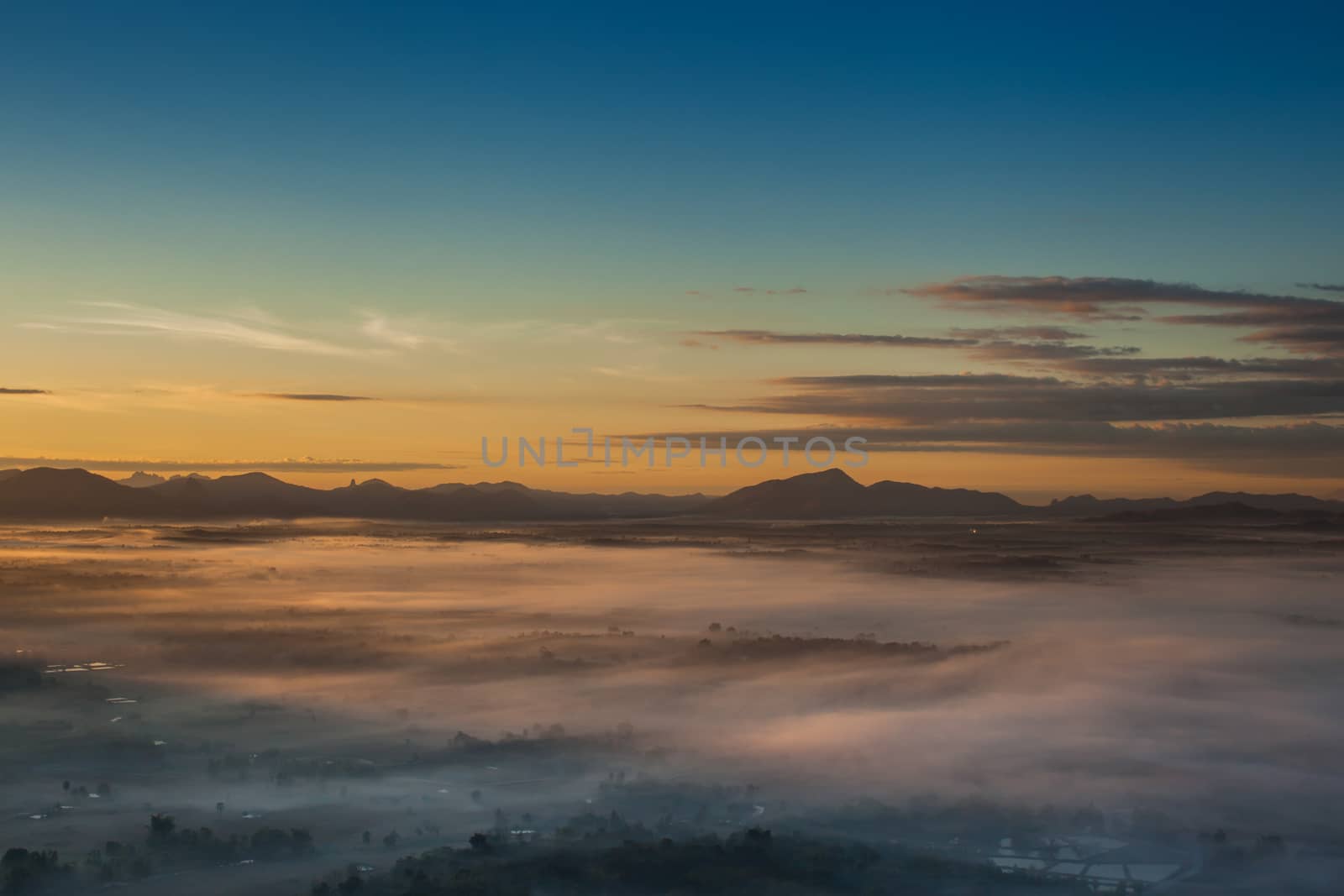 Colorful sky of sunrise above mountain on cloudy at winter season location at Loei province north east of Thailand