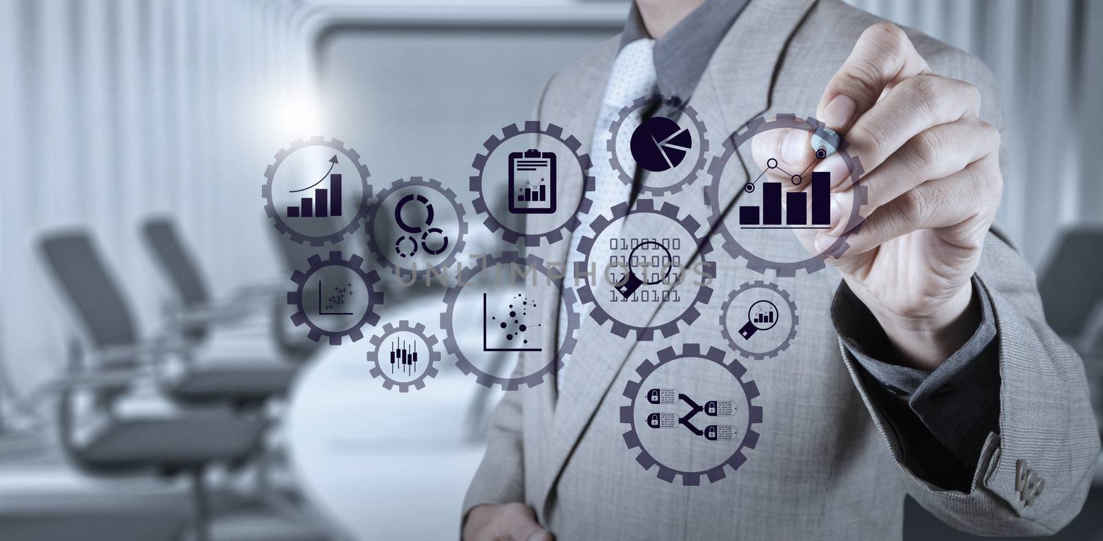 Business data analytics management with connected gear cogs with KPI financial charts and graph.