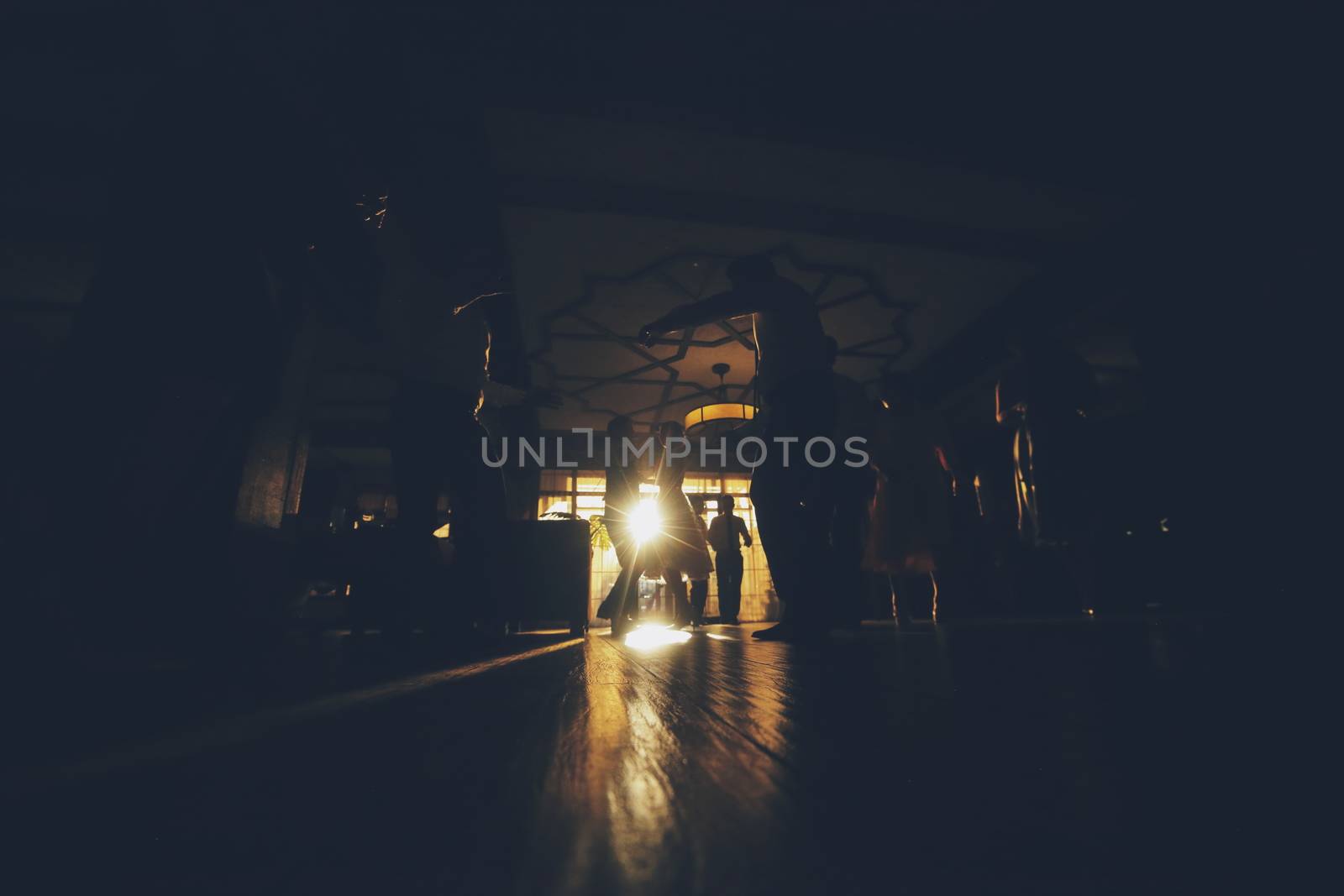 People dance at a party. Fun dancing. Silhouettes in dance. High quality photo