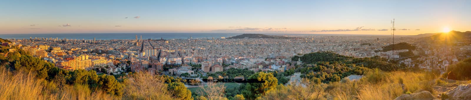 Panorama of Barcelona at sunset by elxeneize