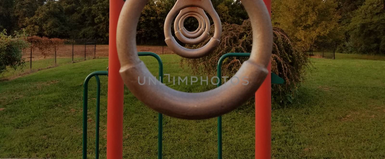 metal rings on a playground by stockphotofan1