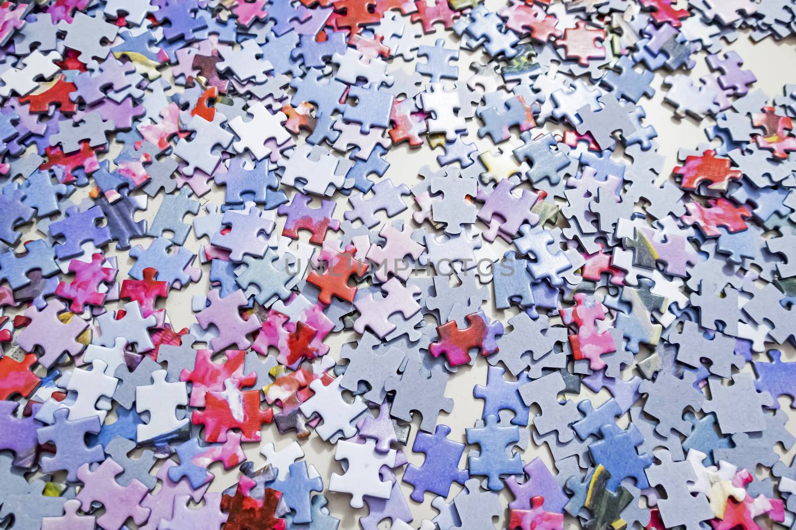 close up jigsaw puzzle pieces on background