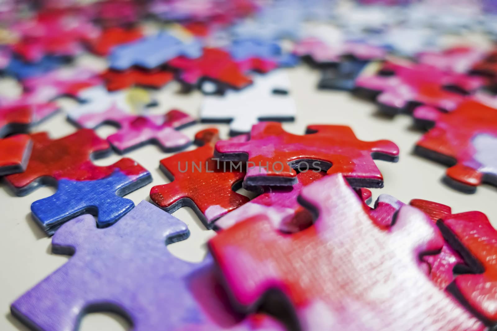 close up jigsaw puzzle pieces on background