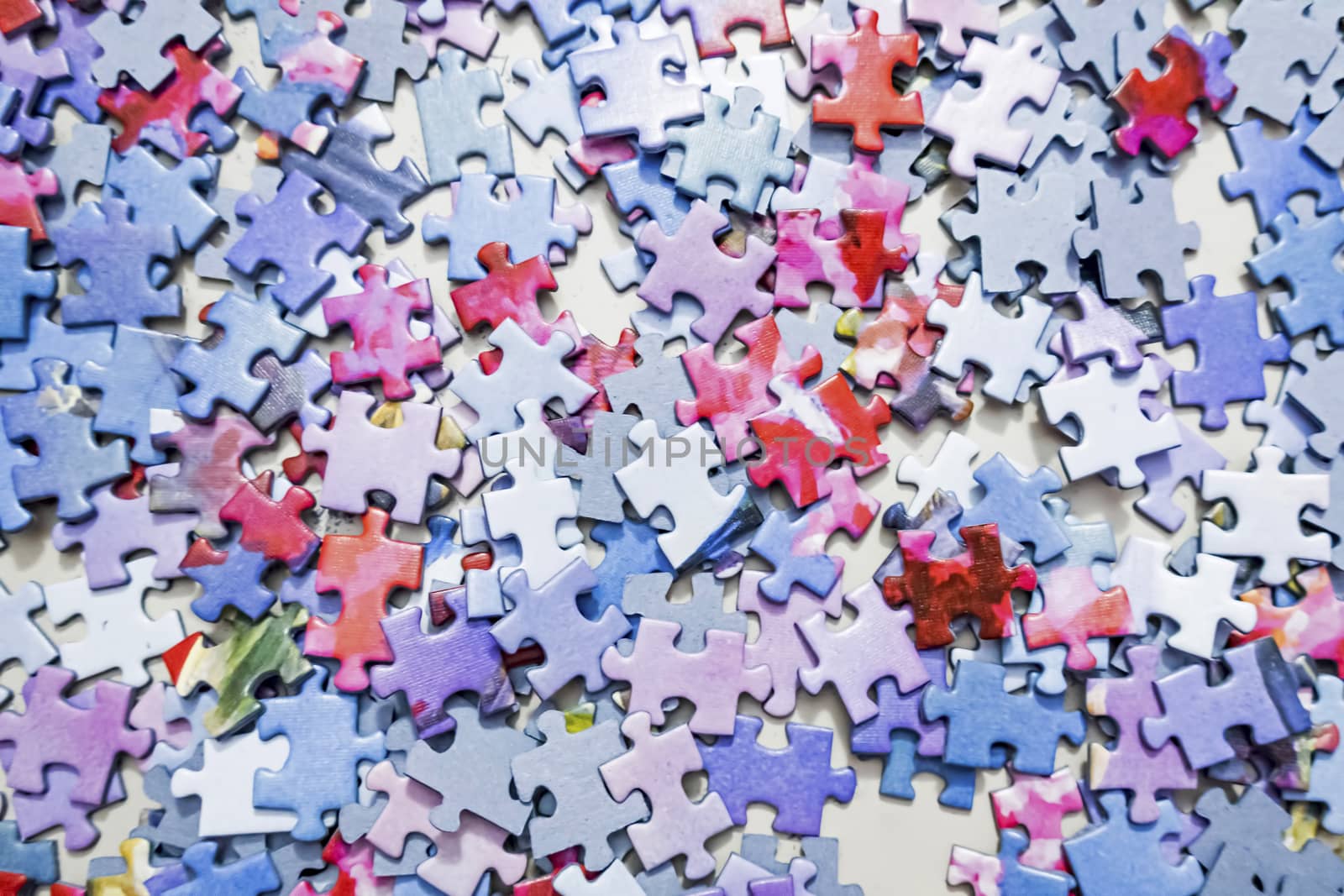 close up jigsaw puzzle pieces on background