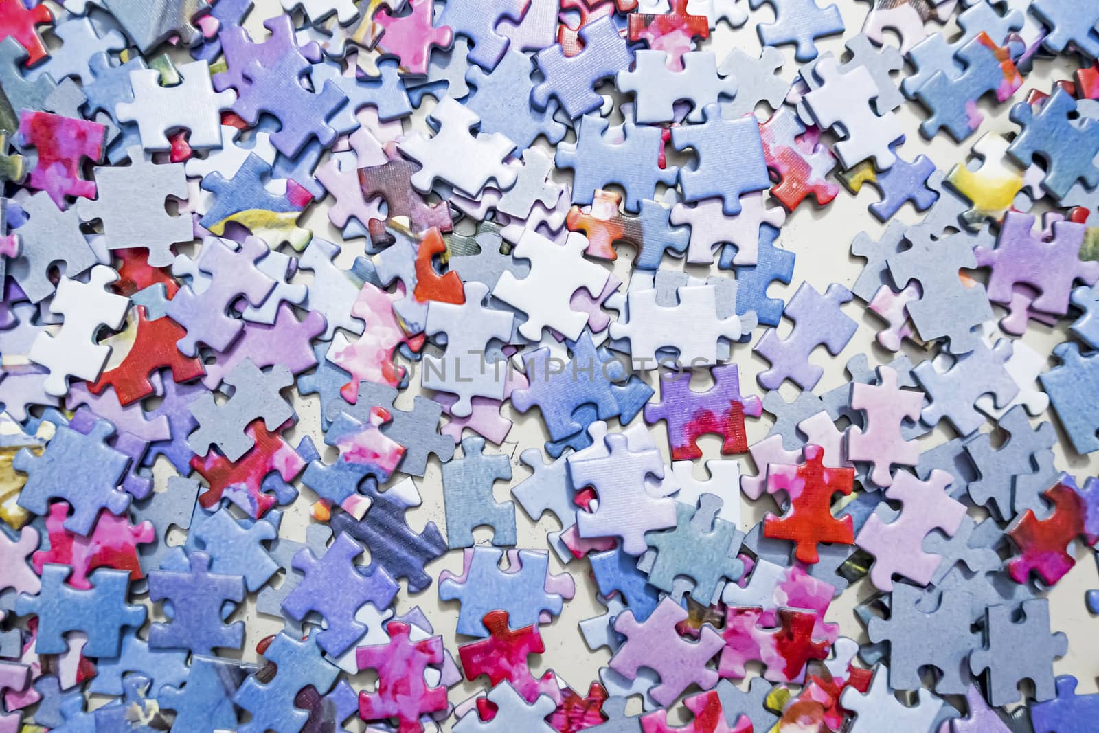close up jigsaw puzzle pieces on background