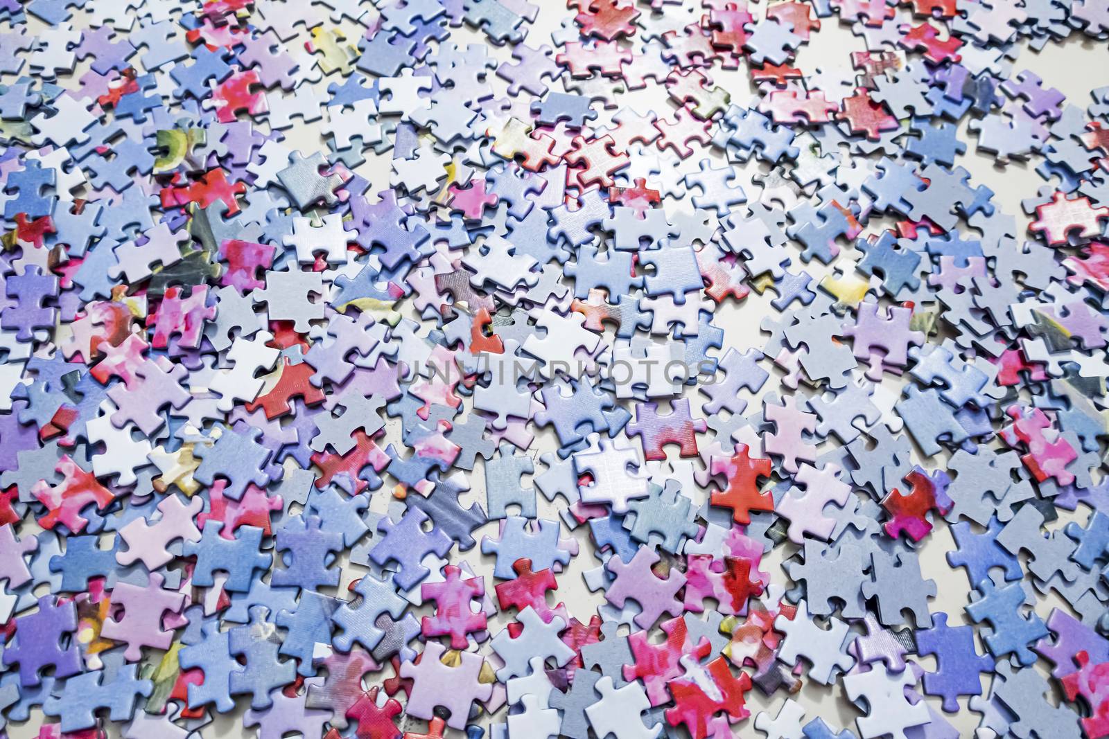 close up jigsaw puzzle pieces on background