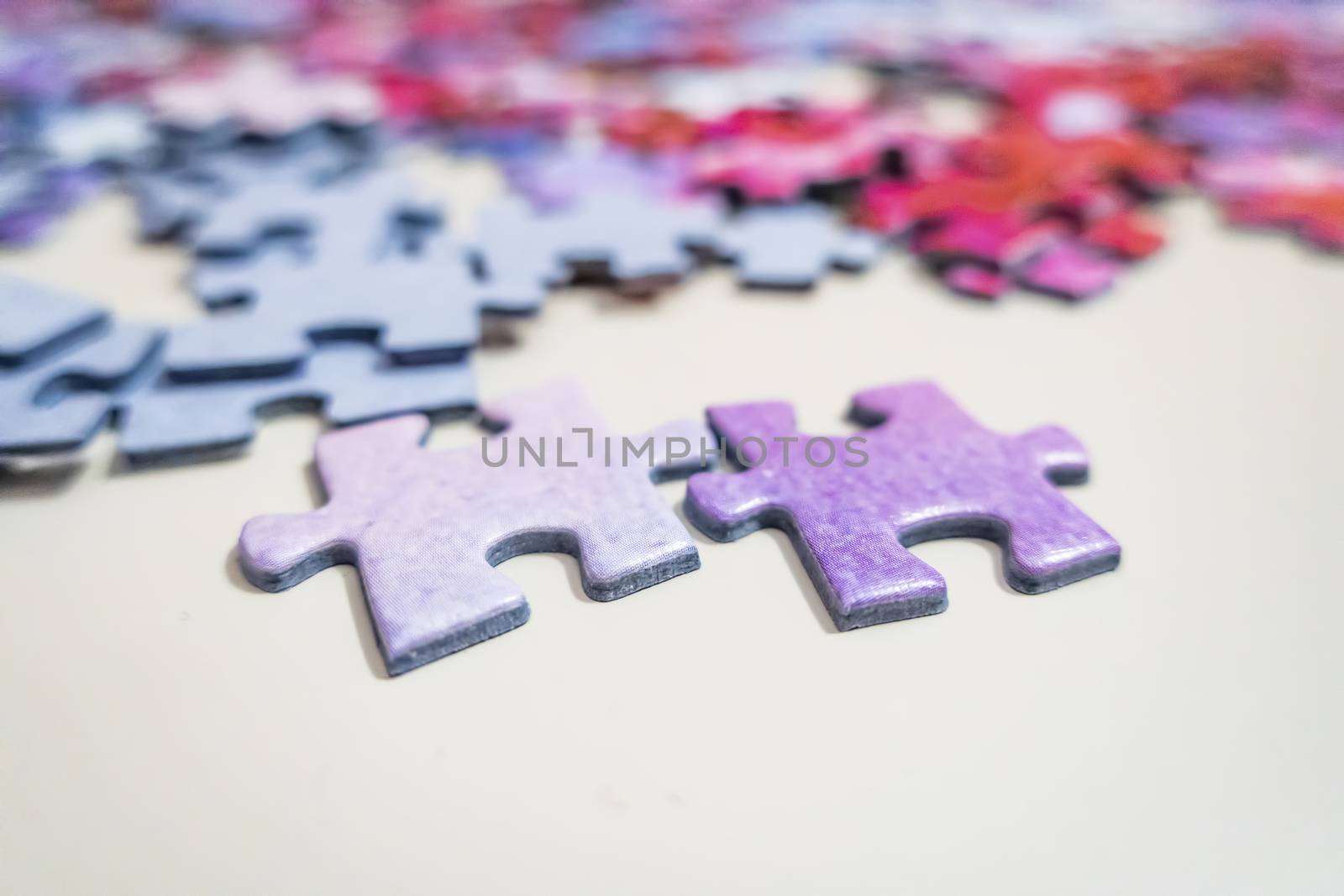 close up jigsaw puzzle pieces on background
