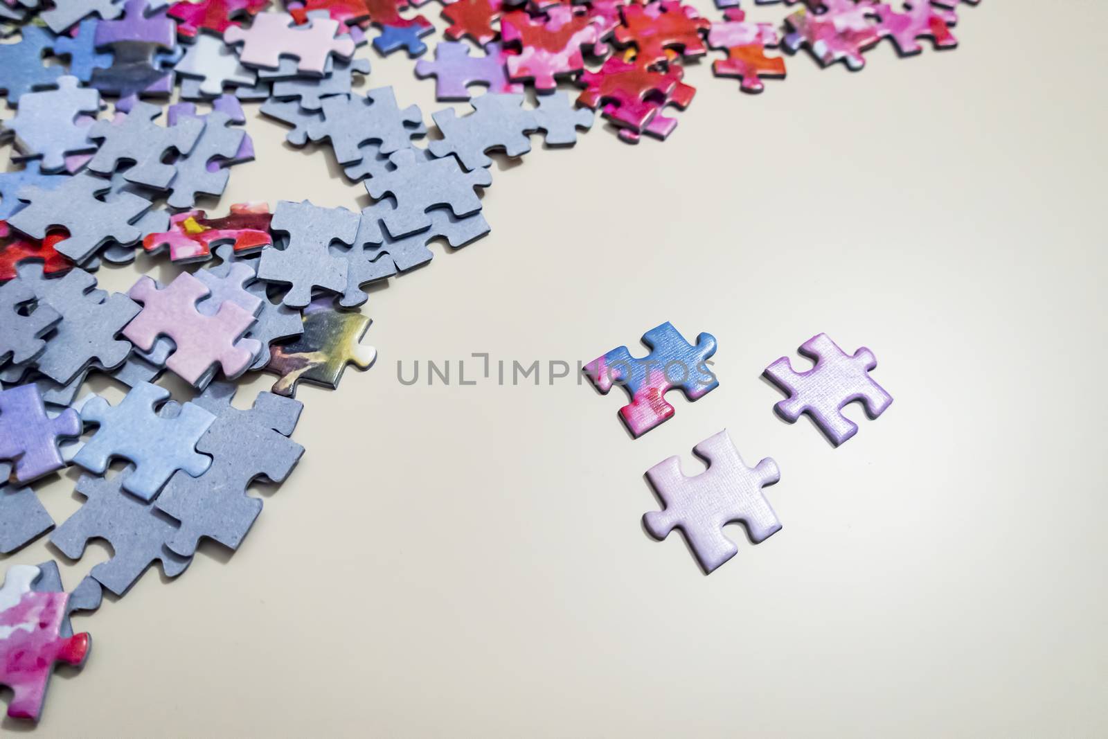 close up jigsaw puzzle pieces on background