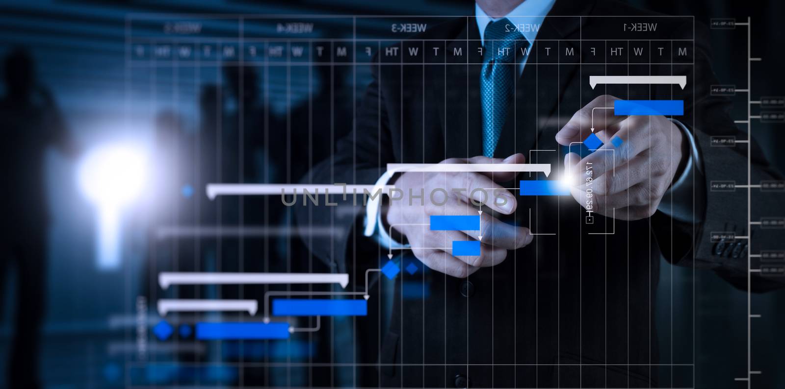 Project manager working and update tasks with milestones progress planning and Gantt chart scheduling diagram.Businessman hand pressing an imaginary button on virtual screen.