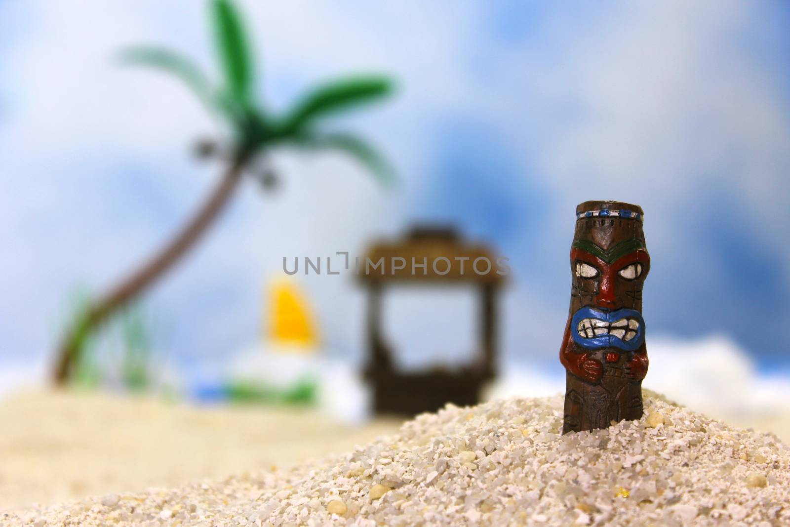 Tiki Statue on Tropical Beach Shallow DOF