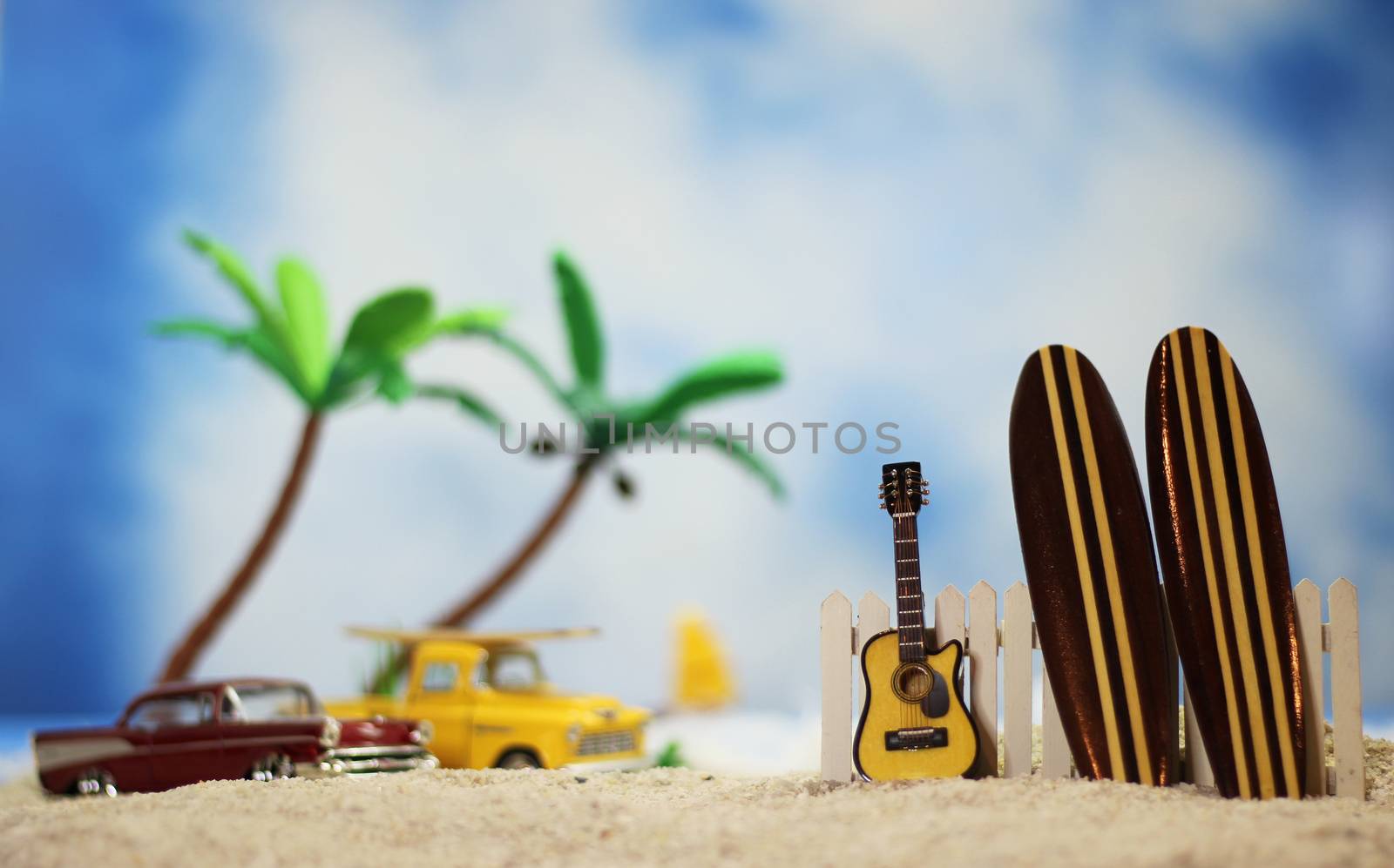 Surfboards on Tropical Beach with vintage cars by Marti157900