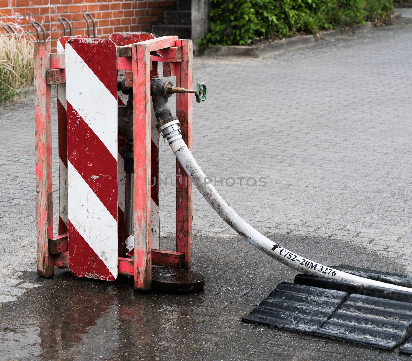 standpipe at a local water connection to supply a construction site with fresh water, Germany