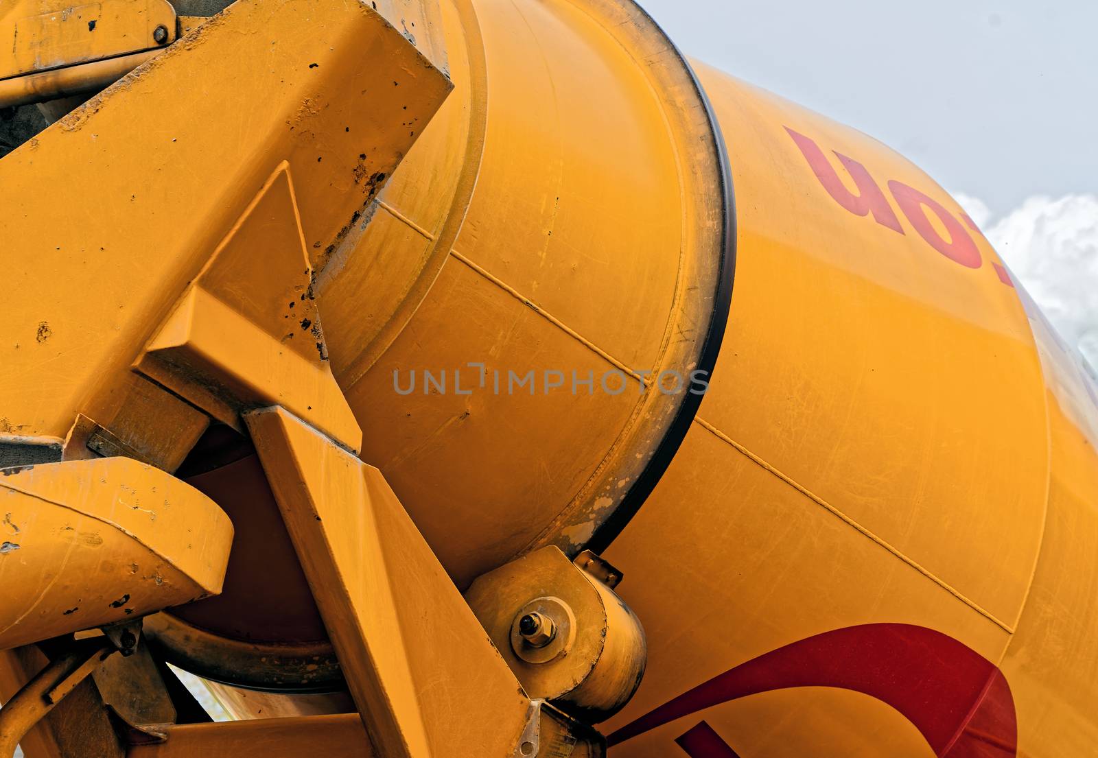 Abstract view of the rear part of a concrete mixer on a construction site by geogif