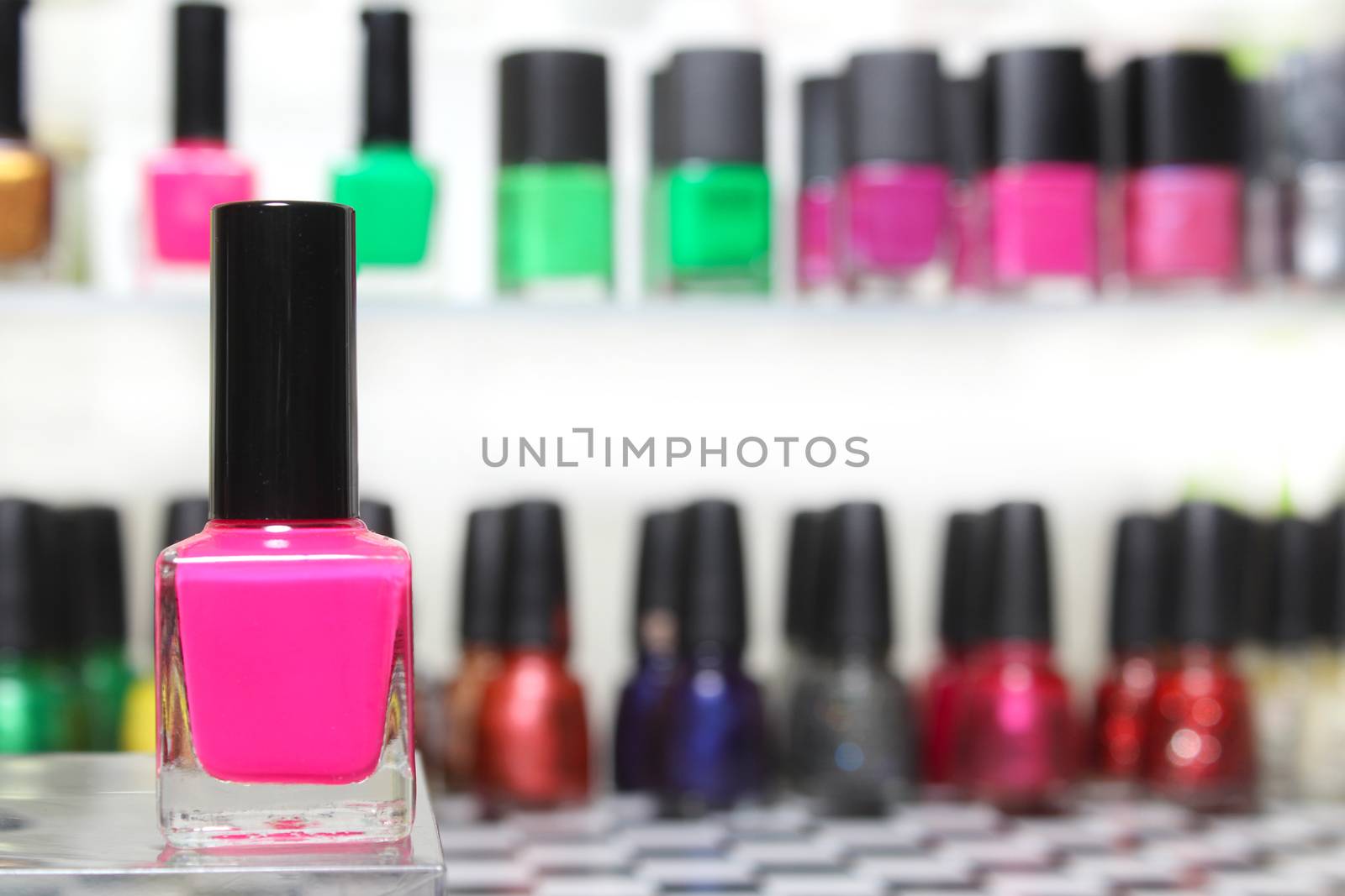 Pink Nail Polish With Blurred Nail Polish Display by Marti157900