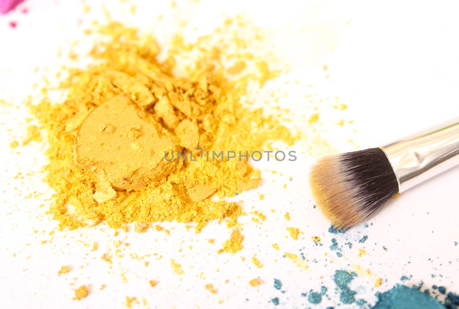 Broken Cosmetic Pigments With Brush on White by Marti157900