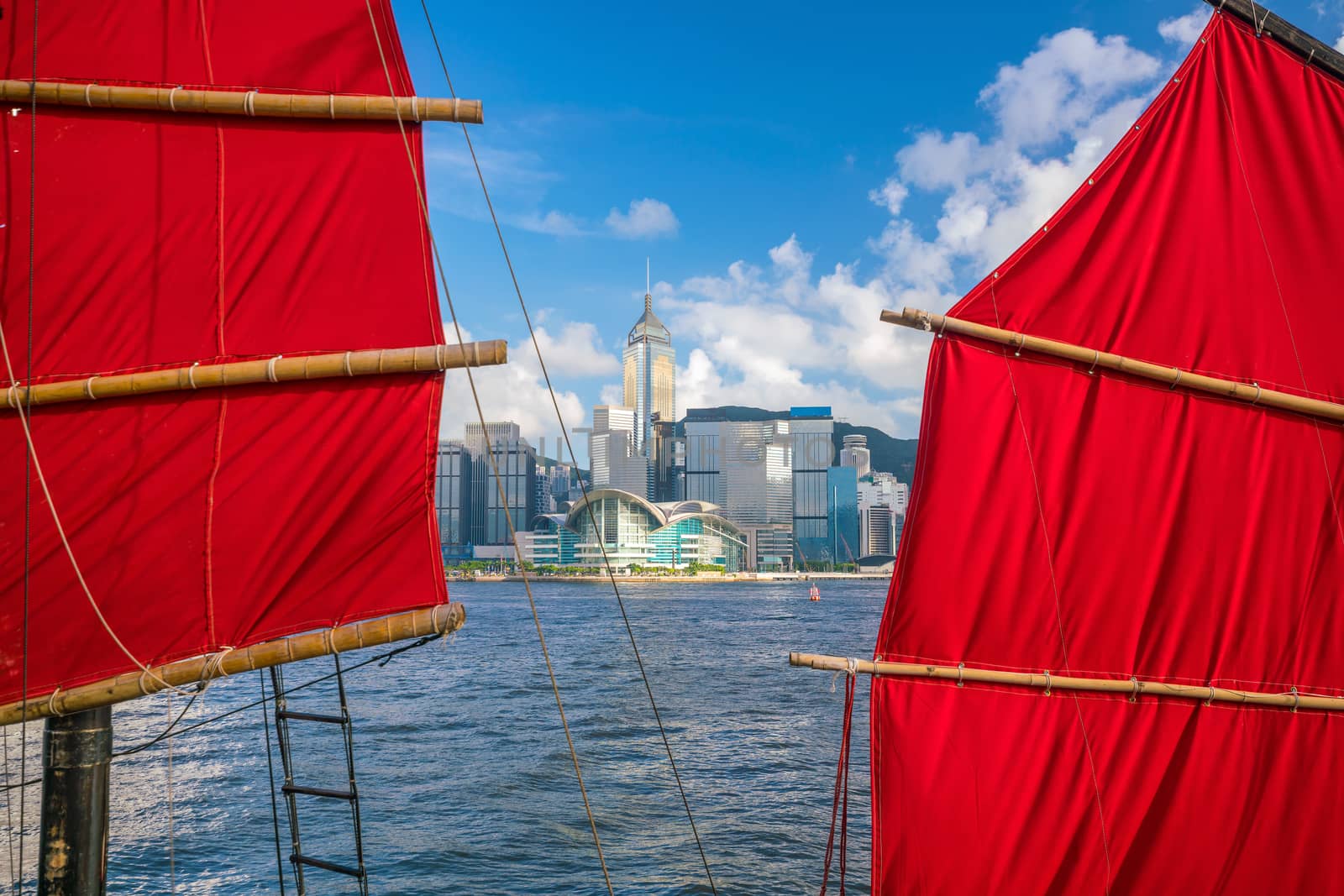 Victoria Harbour  and Hong Kong skyline with vintage ship in China