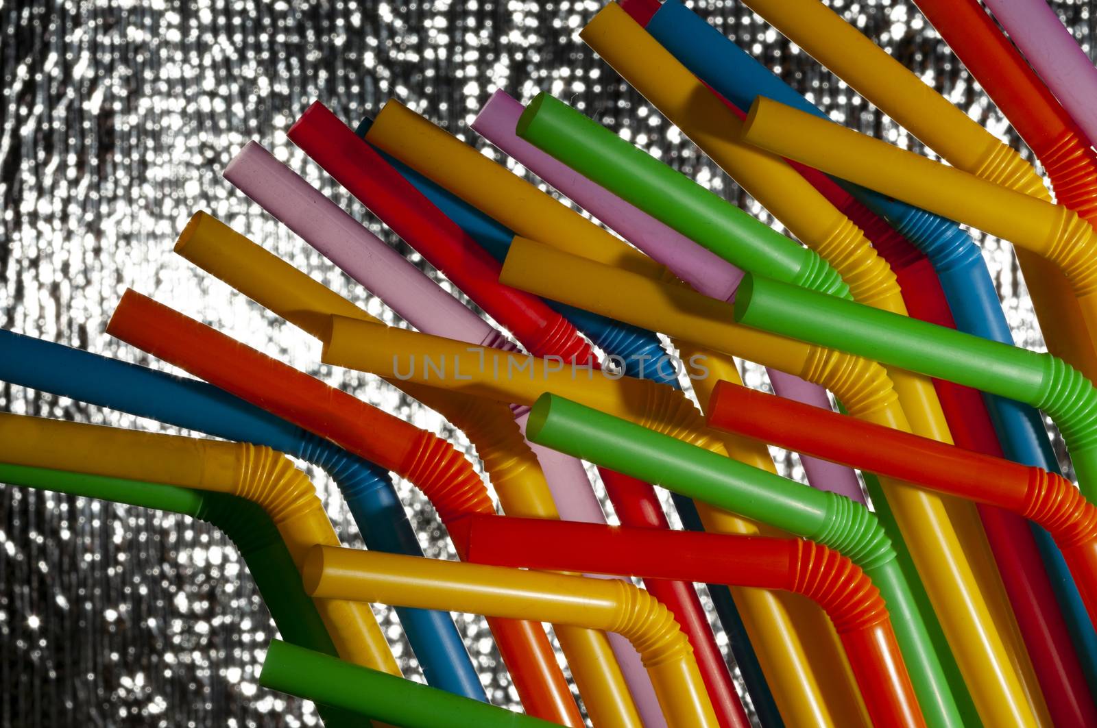 Colorful cocktail straws at the beach bar ready to use