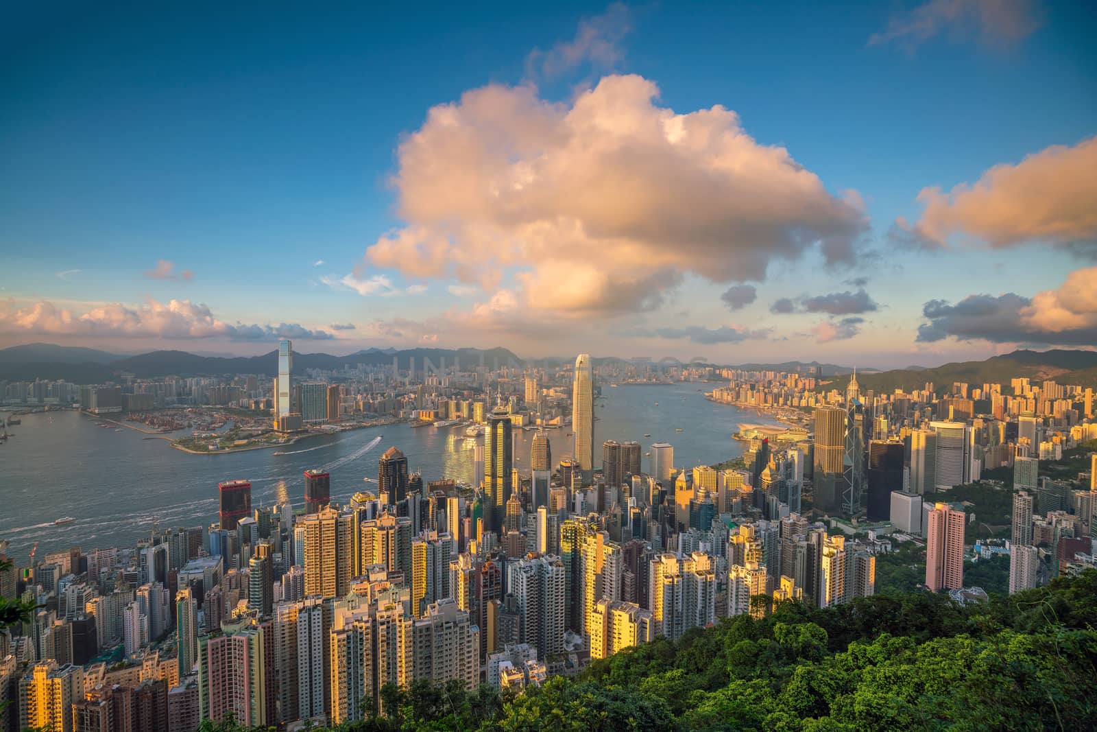 Panoramic view of Victoria Harbor and Hong Kong skyline by f11photo