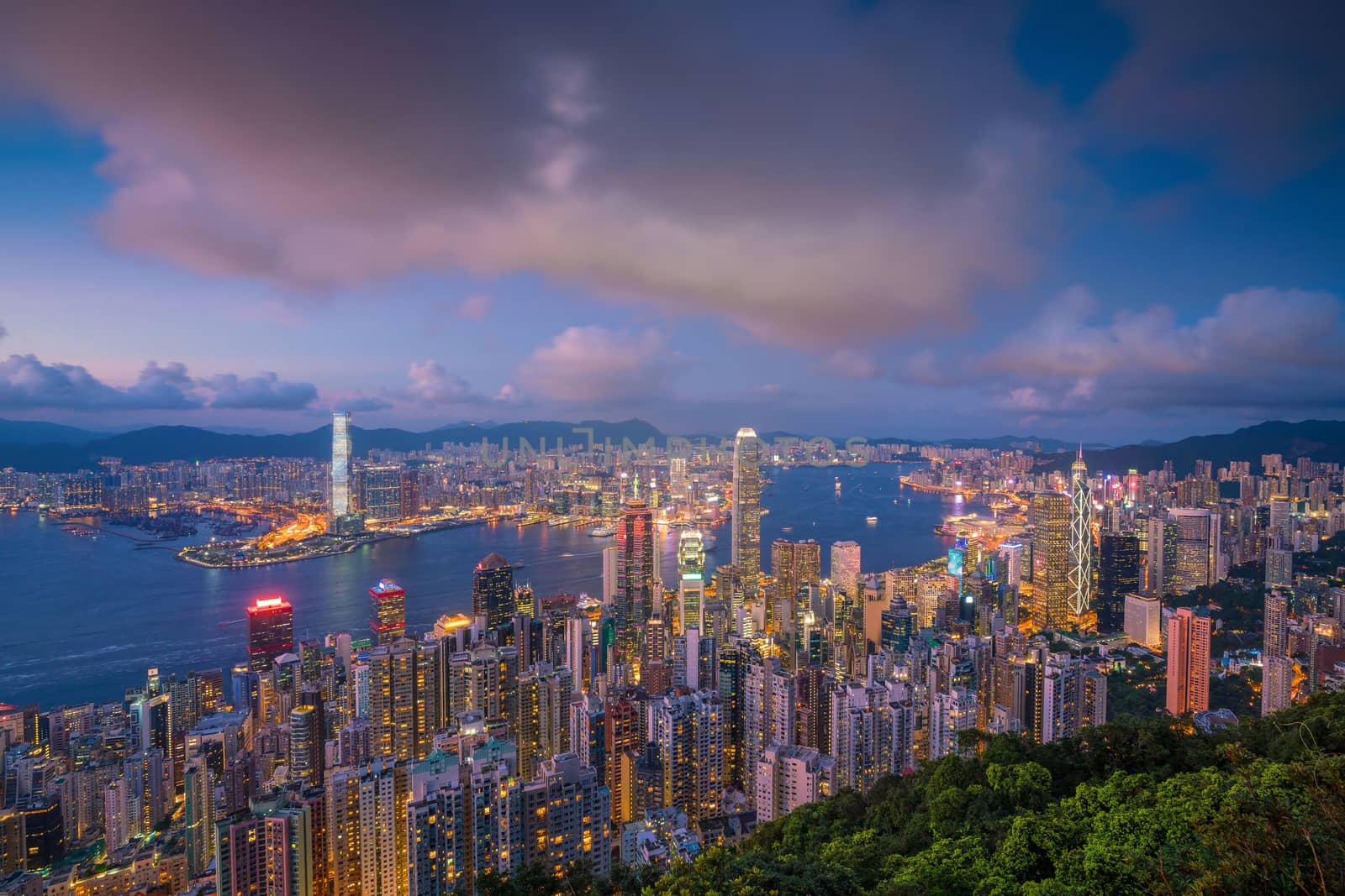 Panoramic view of Victoria Harbor and Hong Kong skyline by f11photo
