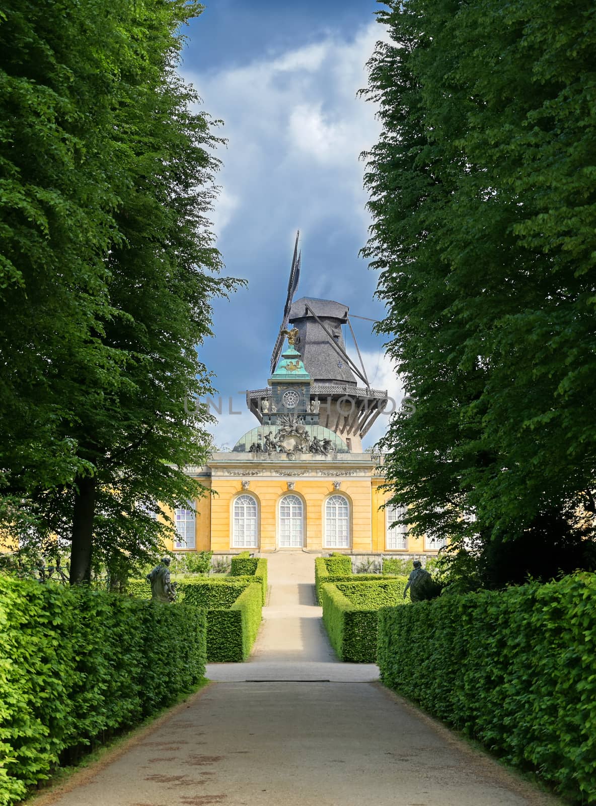 The historic windmill on top of the New Chambers located in Sanssouci Park in Potsdam, Germany.