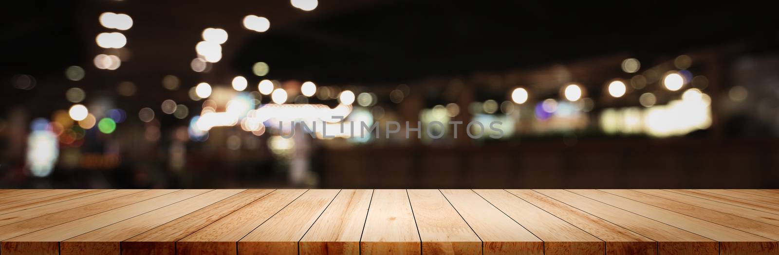 Panoramic empty clean wood counter table top on blur street nigh by golfmhee