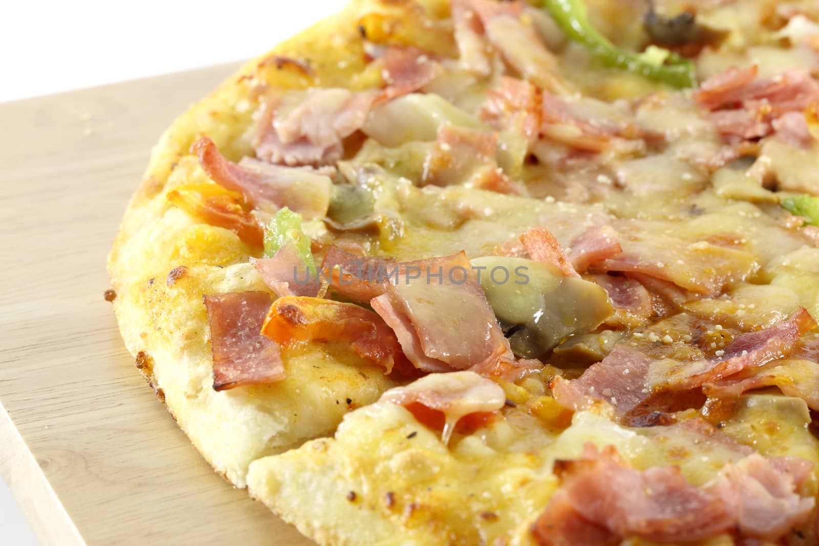 pizza isolated in a white background  by piyato