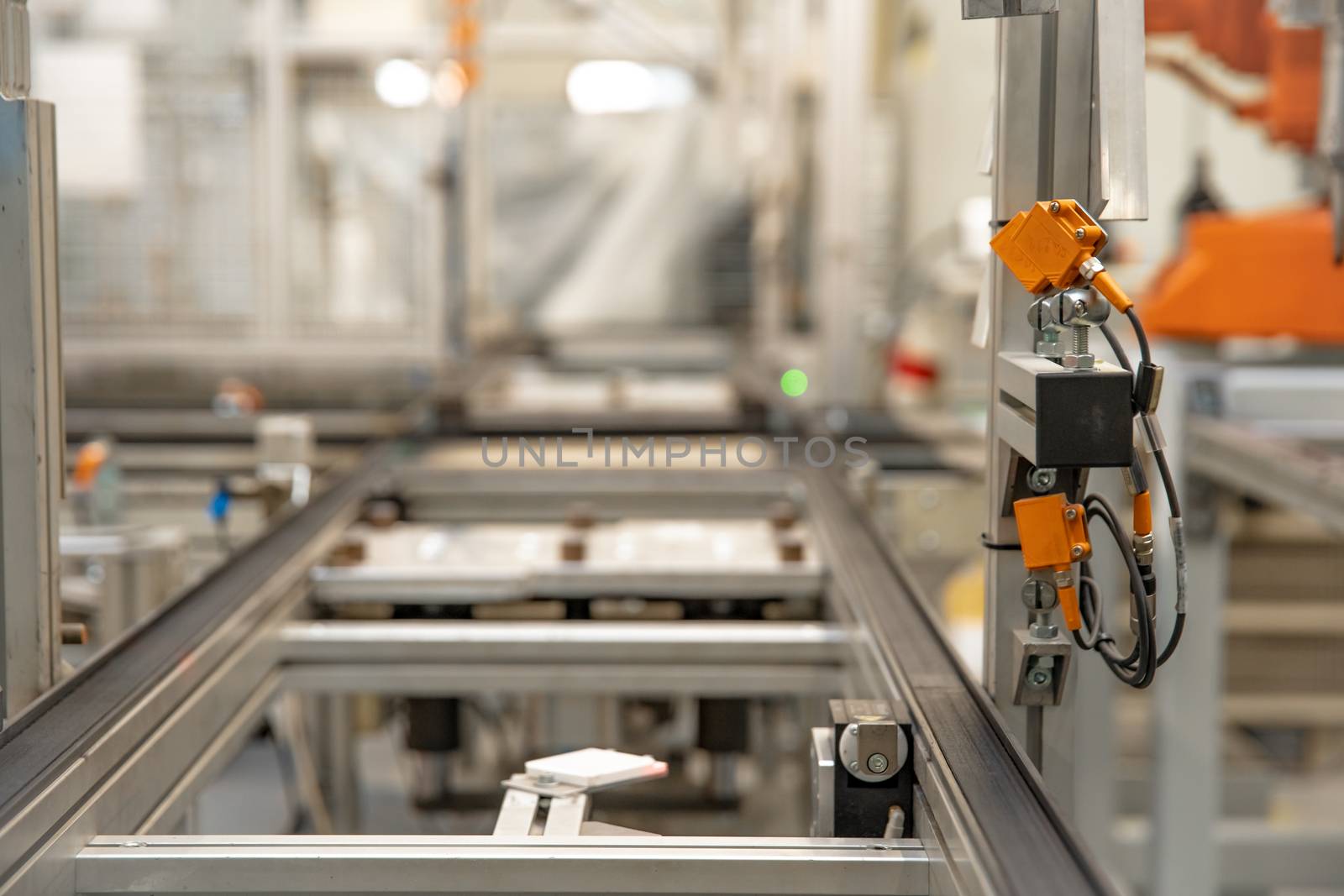 conveyance rail for products during machining automatically by robotic arms.