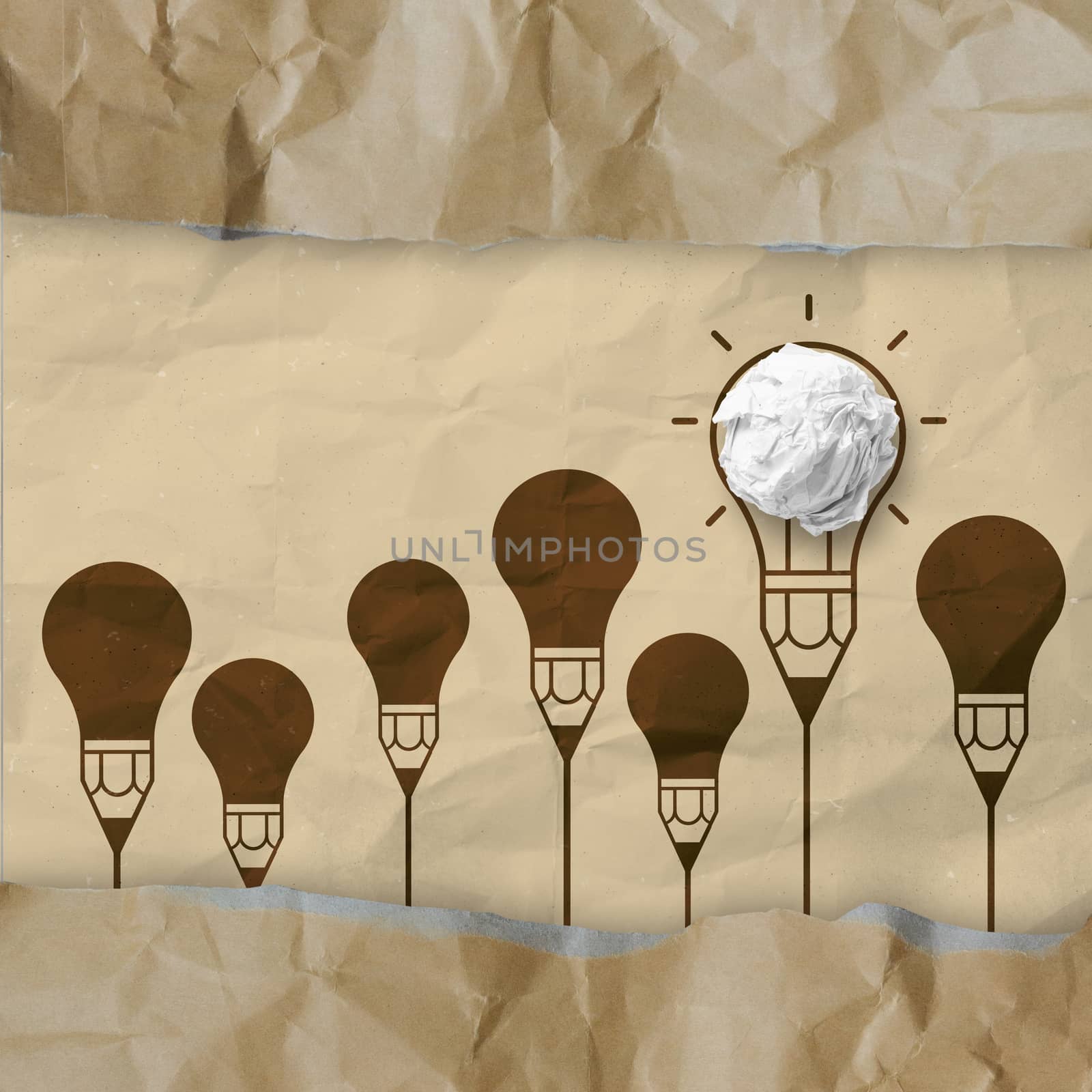 light bulb crumpled paper and recycle envelope as creative concept background
