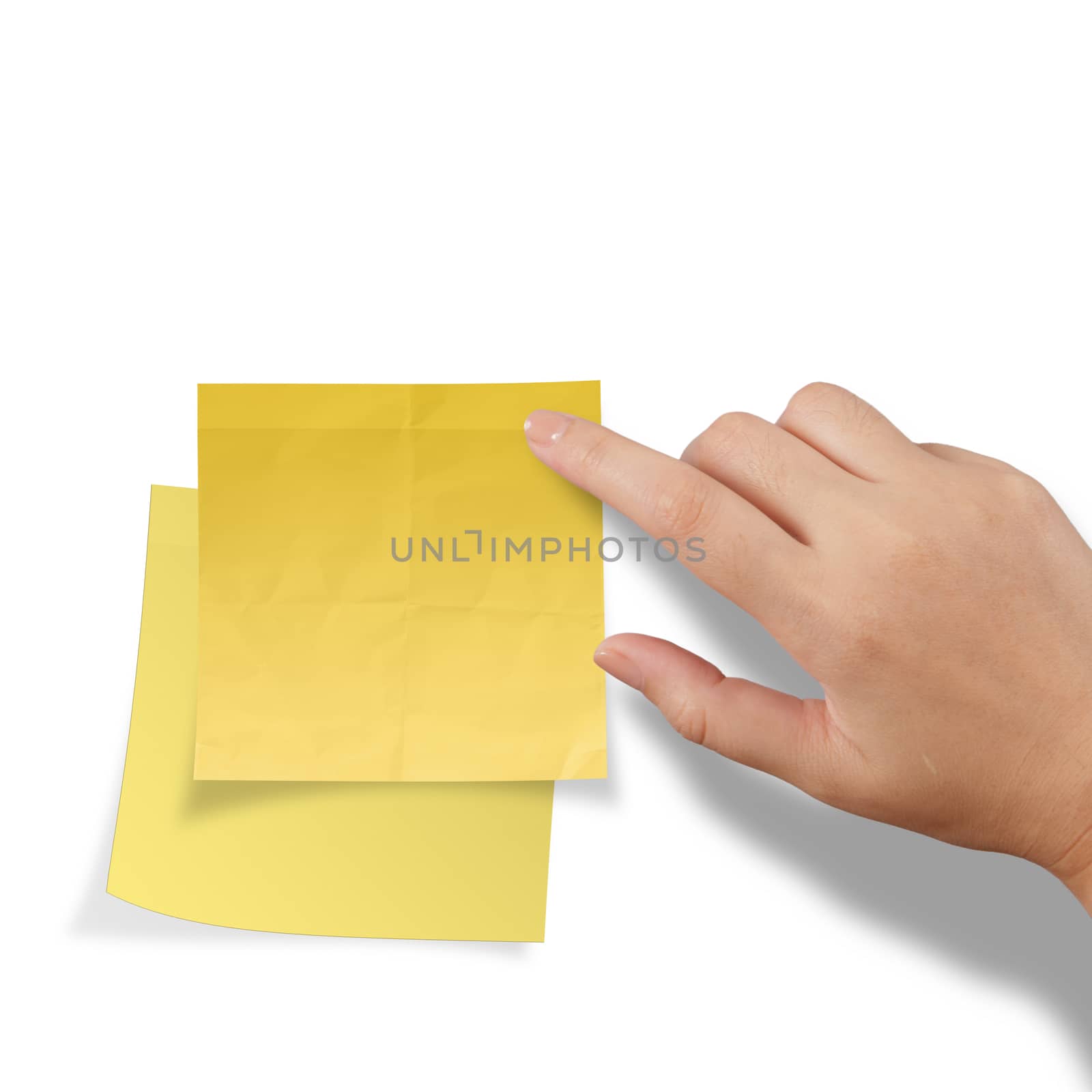 hand touch blank yellow sticky note on white background