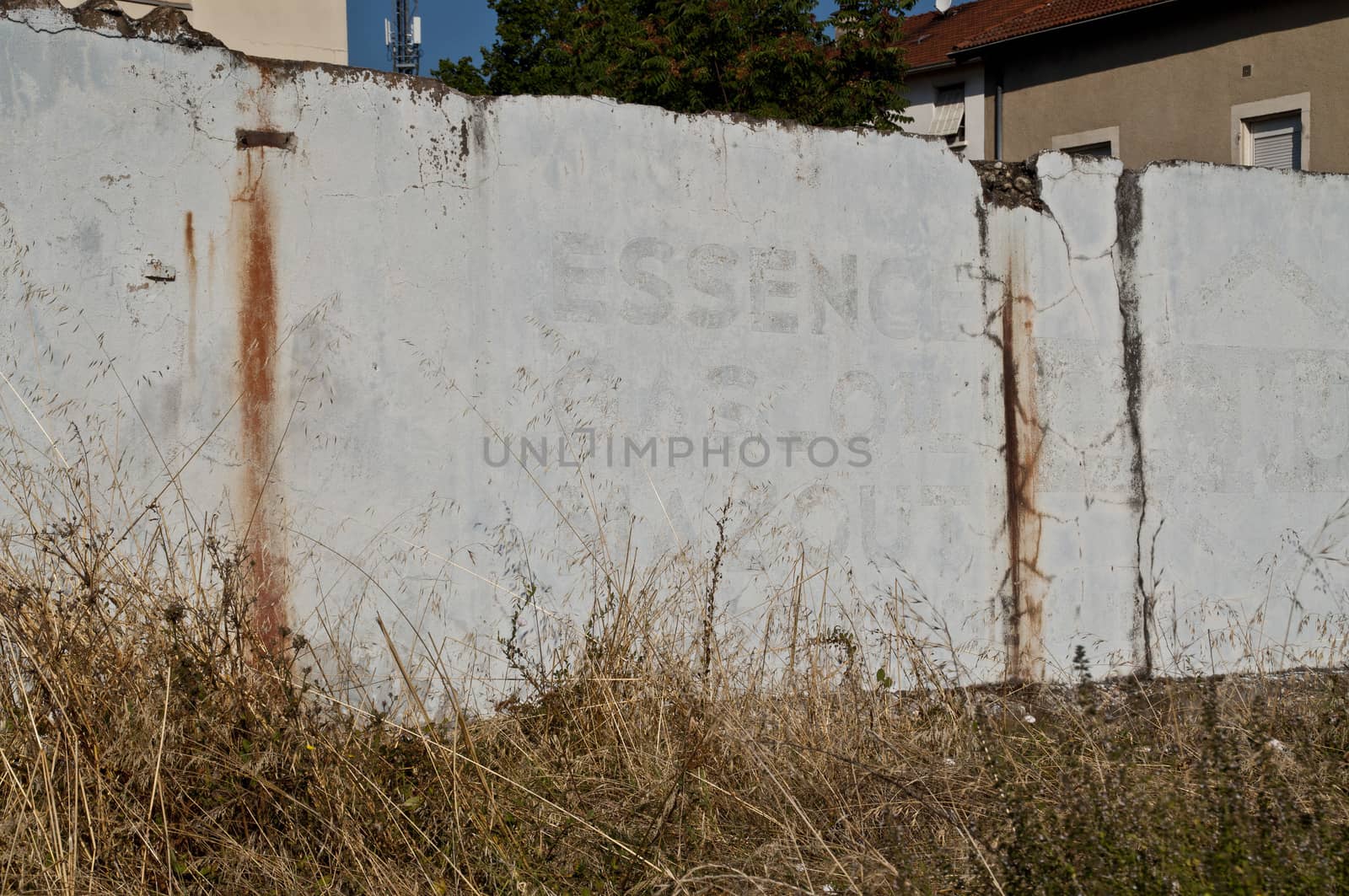 Old advertisement in the demolished Stade de la Palla football stadium in Valence, France.