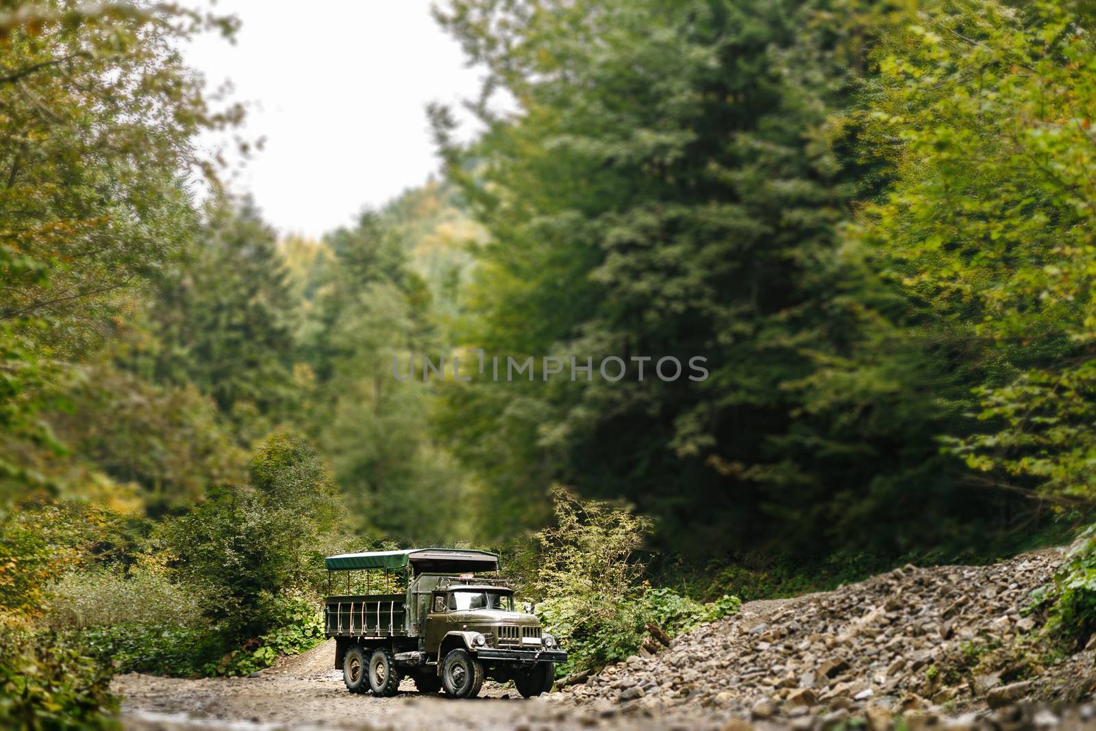 Soviet truck in the Carpathian Mountains carries people on excursions. by Denys_N