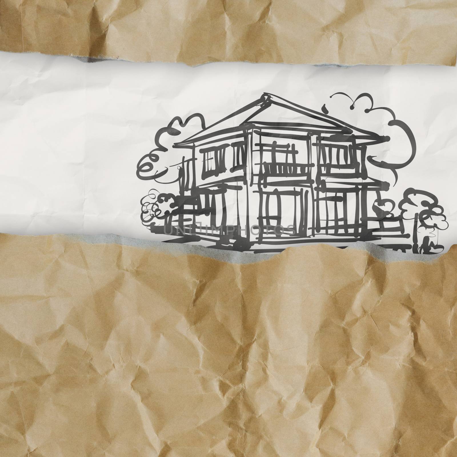 drawing house on wrinkled paper as concept by everythingpossible