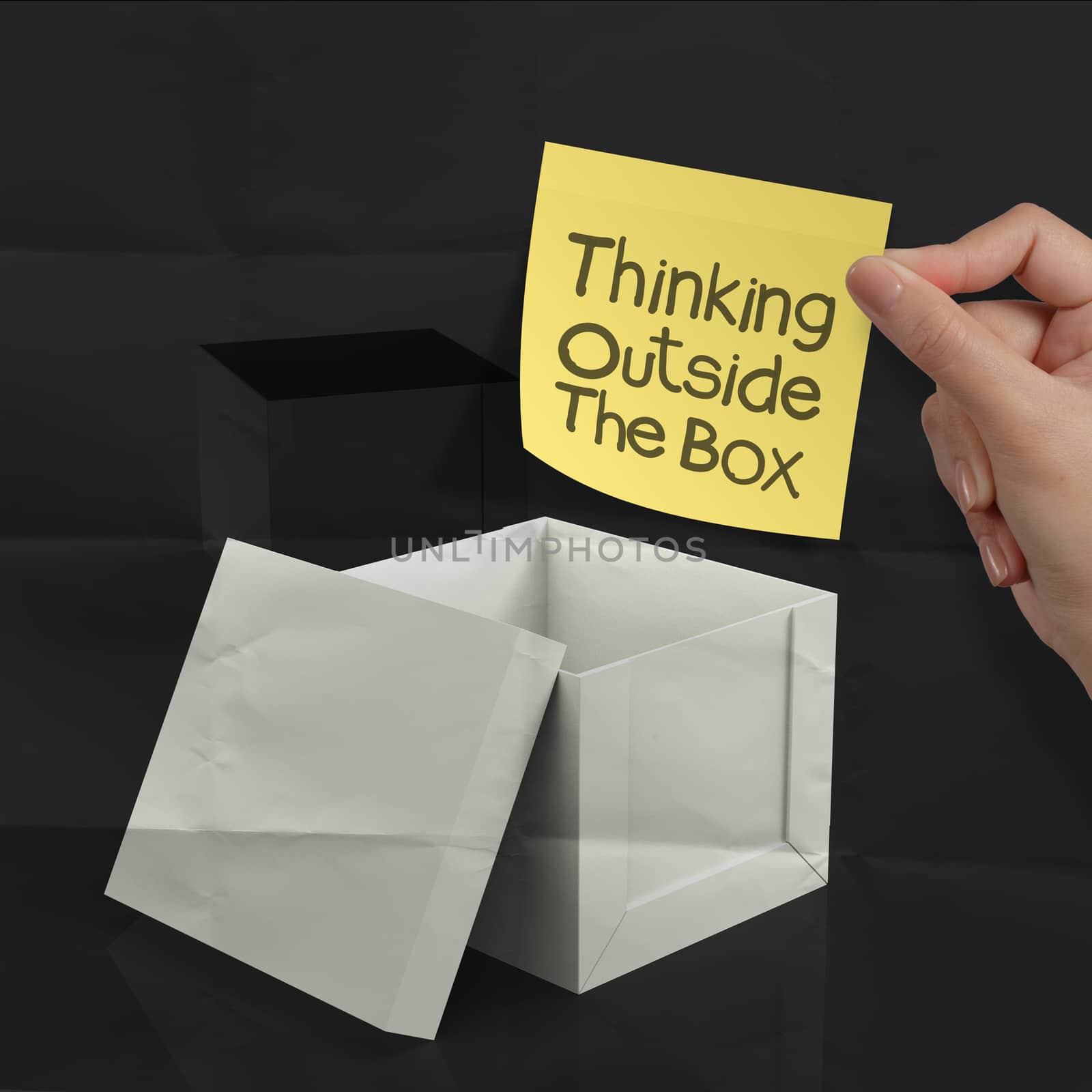 thinking outside the box on crumpled sticky note paper as concept