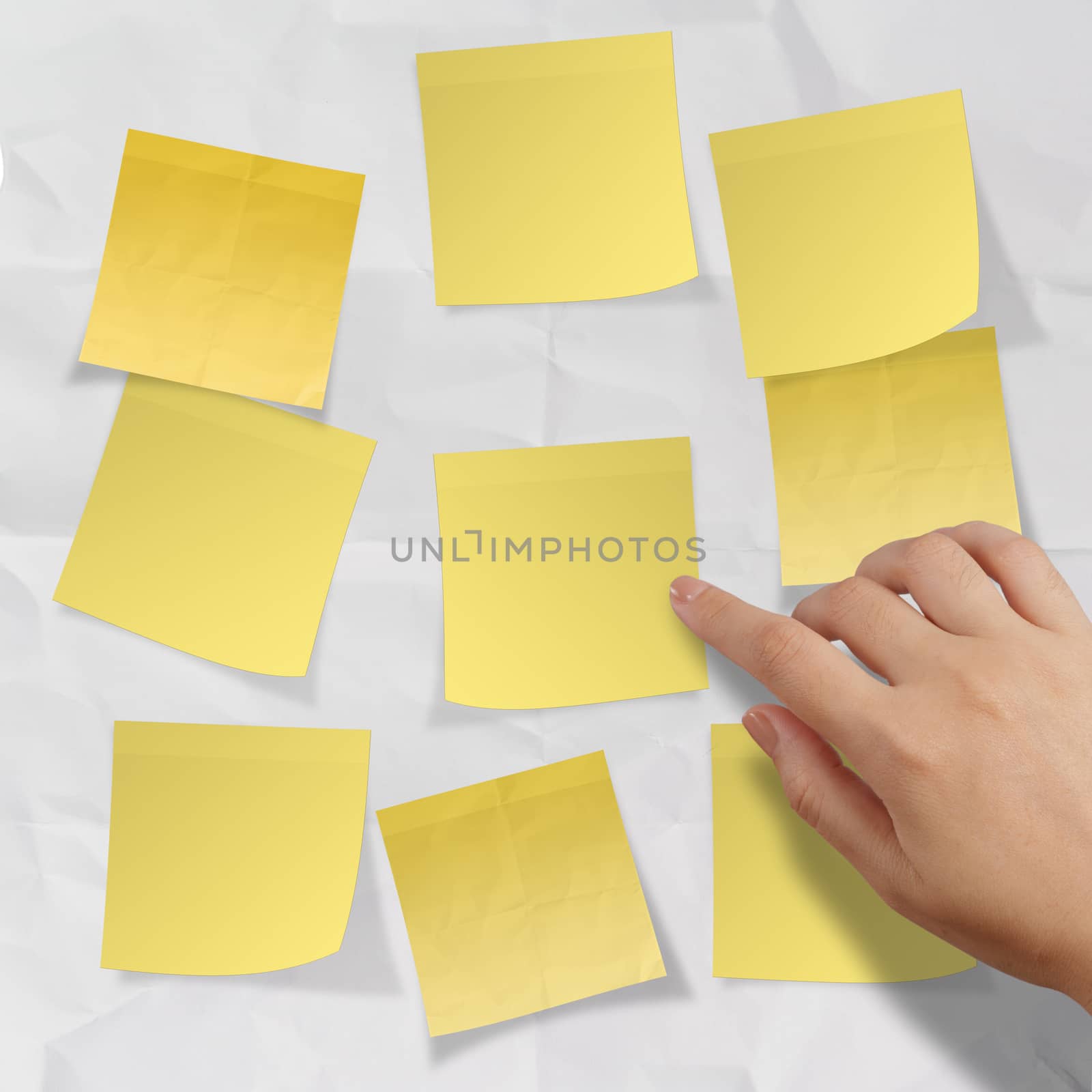 blank crumpled sticky note paper on texture paper as concept by everythingpossible