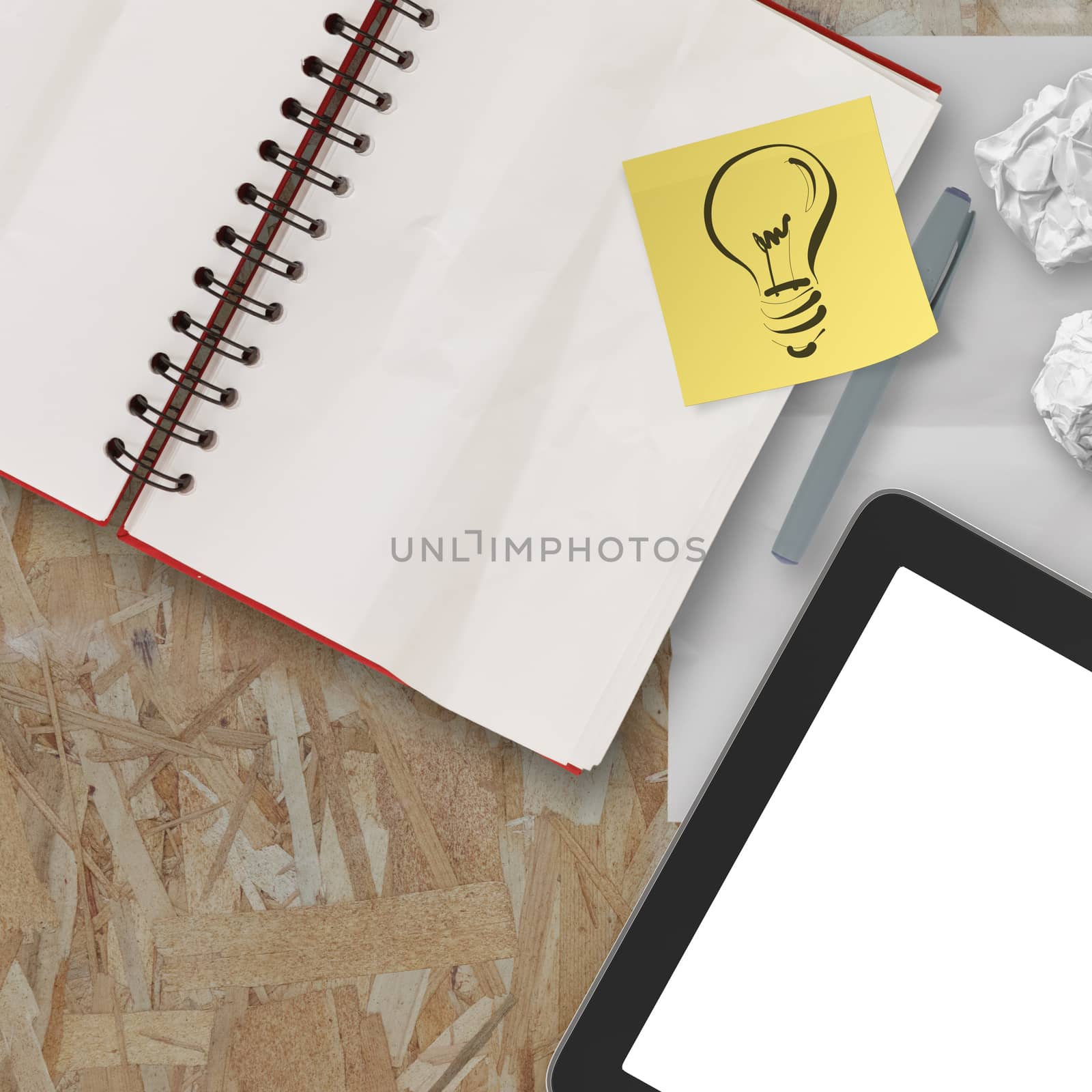 Notebook and pen and tablet on recycle wood table background