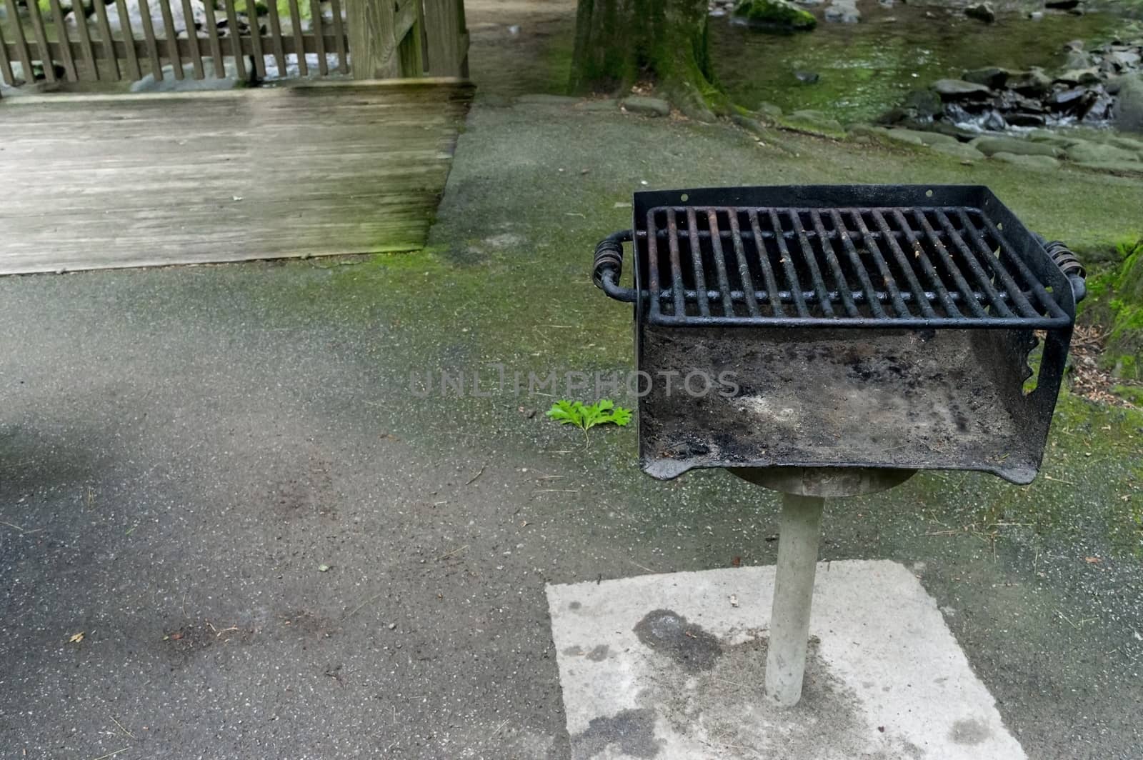 Horizontal shot of a well worn barbecue grill with copy space.