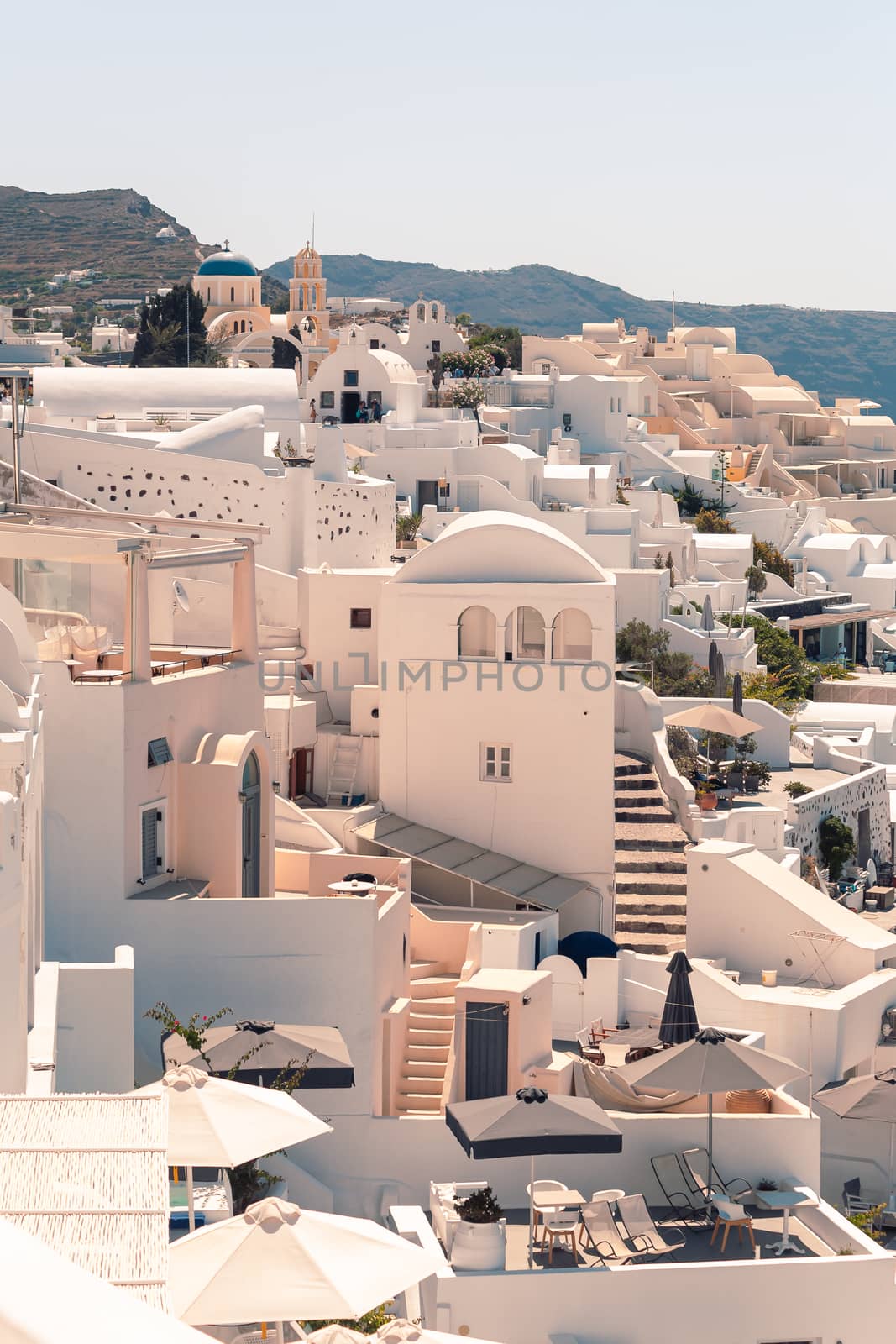 Classical view on the decoration and architecture of Oia village Santorini at sun weather