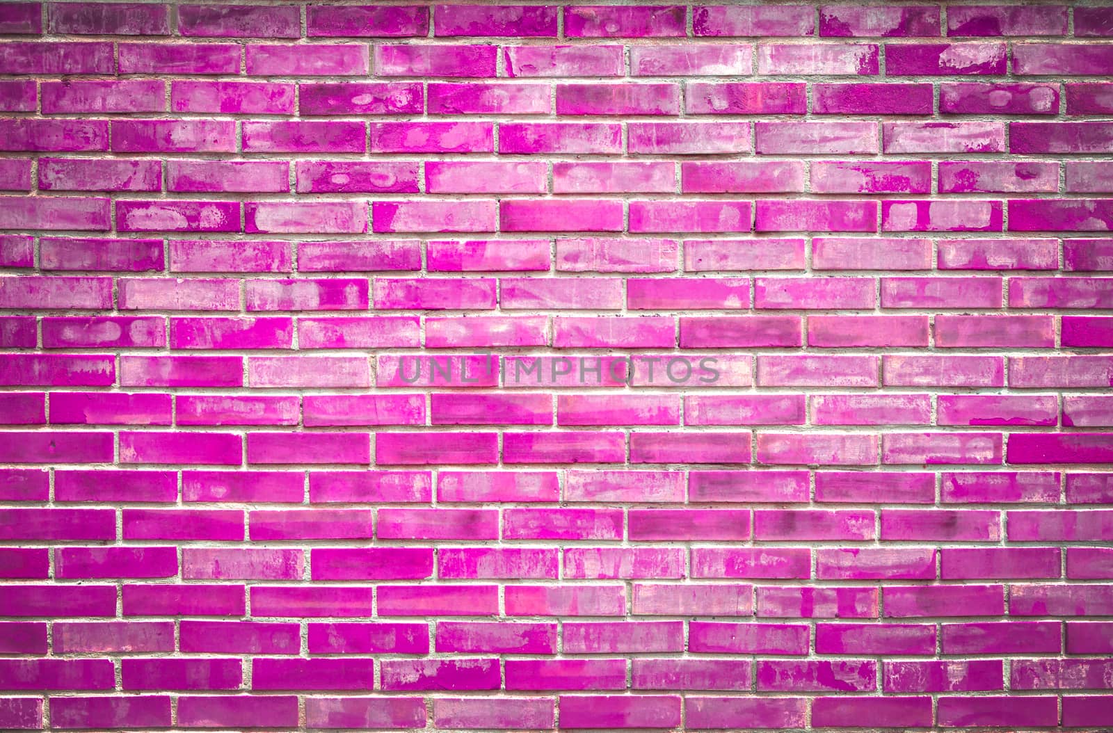 Bright colorful fuchsia brick wall