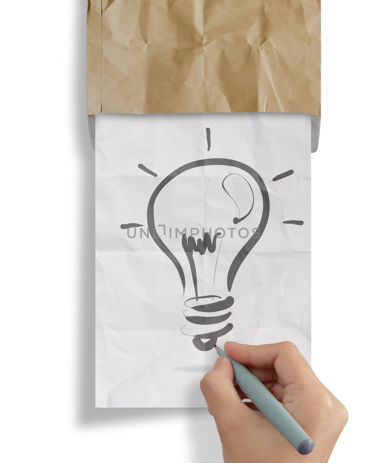 hand draws light bulb crumpled paperfrom recycle envelope as creative concept