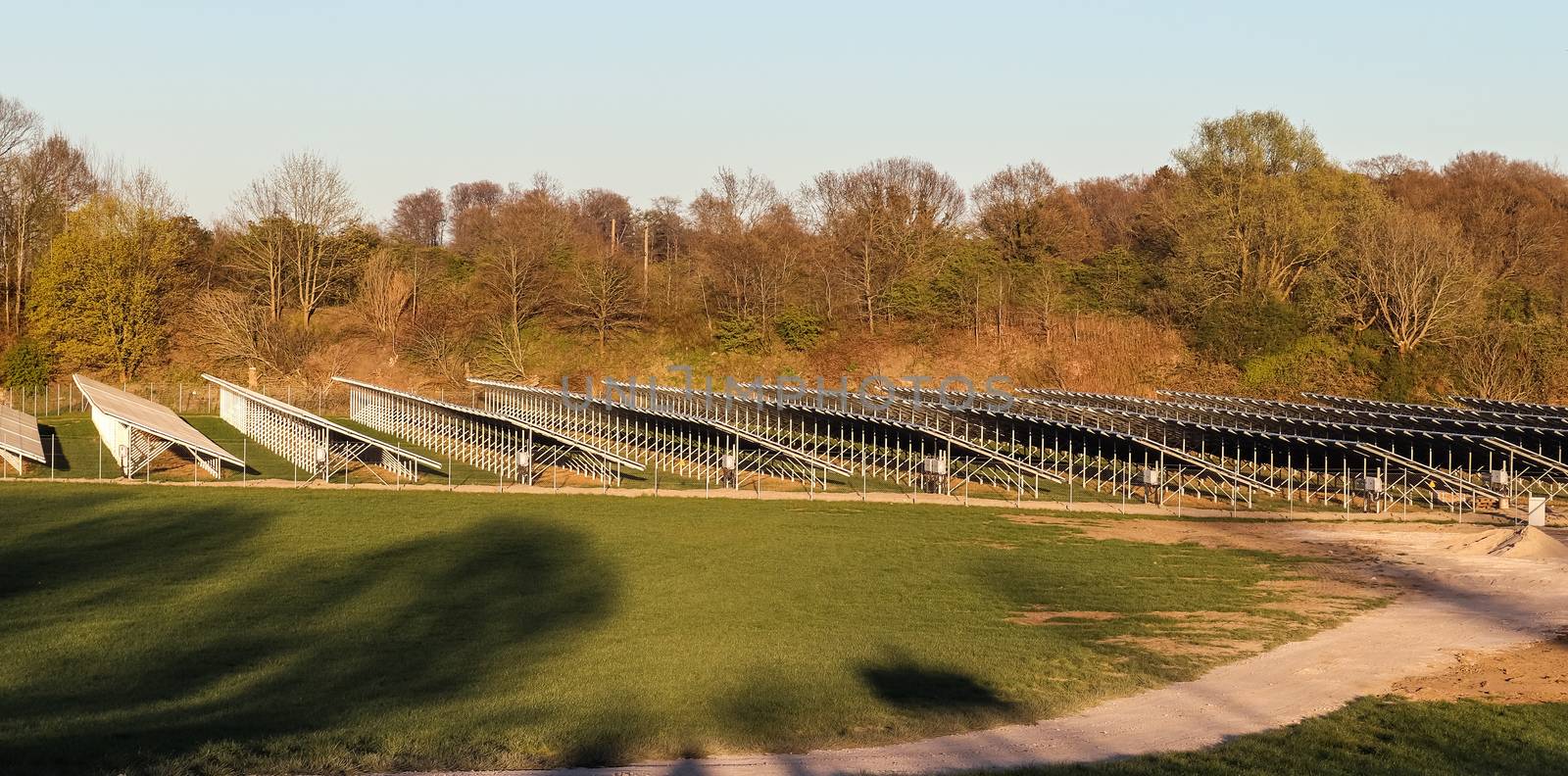 Generating clean energy with solar modules in a big park in nort by MP_foto71