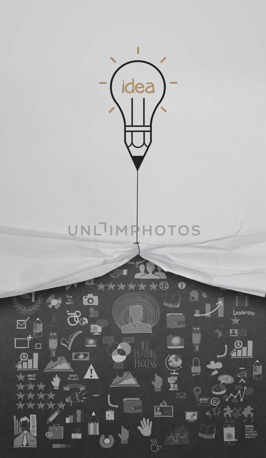pencil lightbulb draw rope open wrinkled paper show business strategy as concept