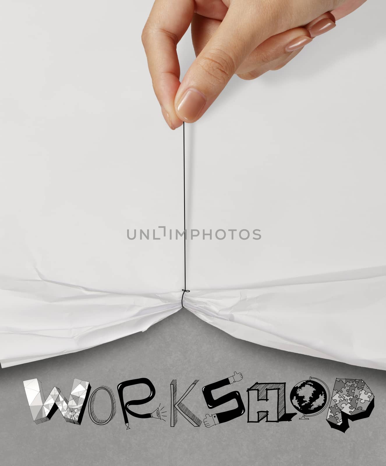 business hand pull rope open wrinkled paper show WORKSHOP design text as concept