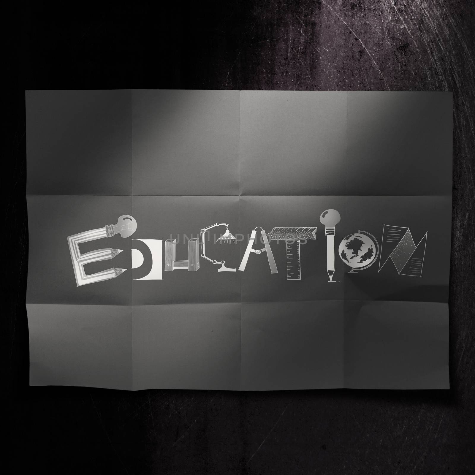 design word EDUCATION on dark crumpled paper and texture backgro by everythingpossible