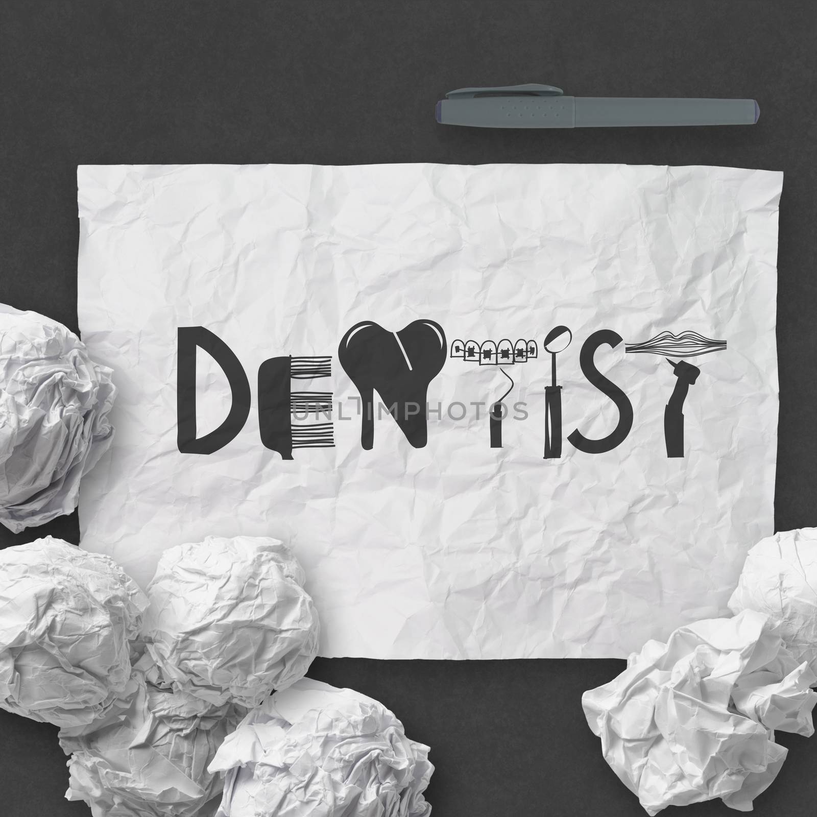 design word  DENTIST on white crumpled paper and texture background as concept