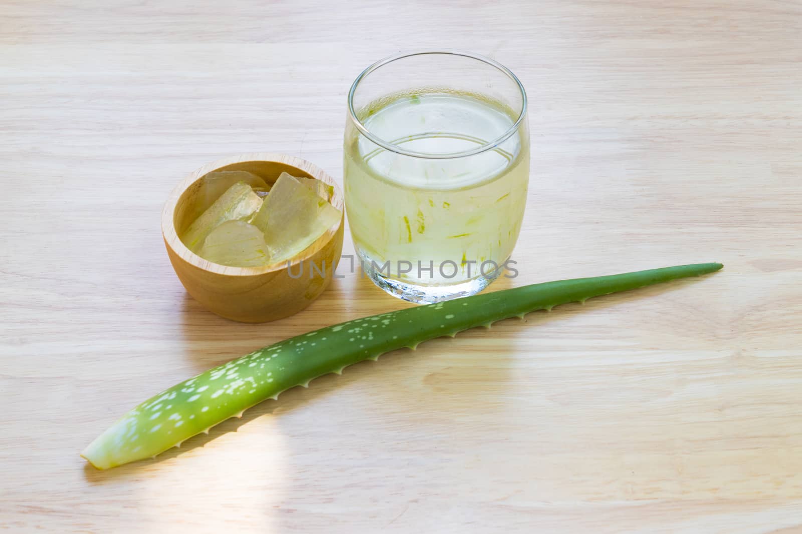 Aloe Vera for drinking on wood table 