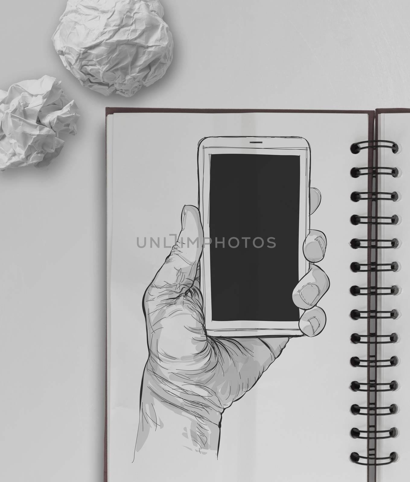 Hand drawn hands with mobile phone note book as concept