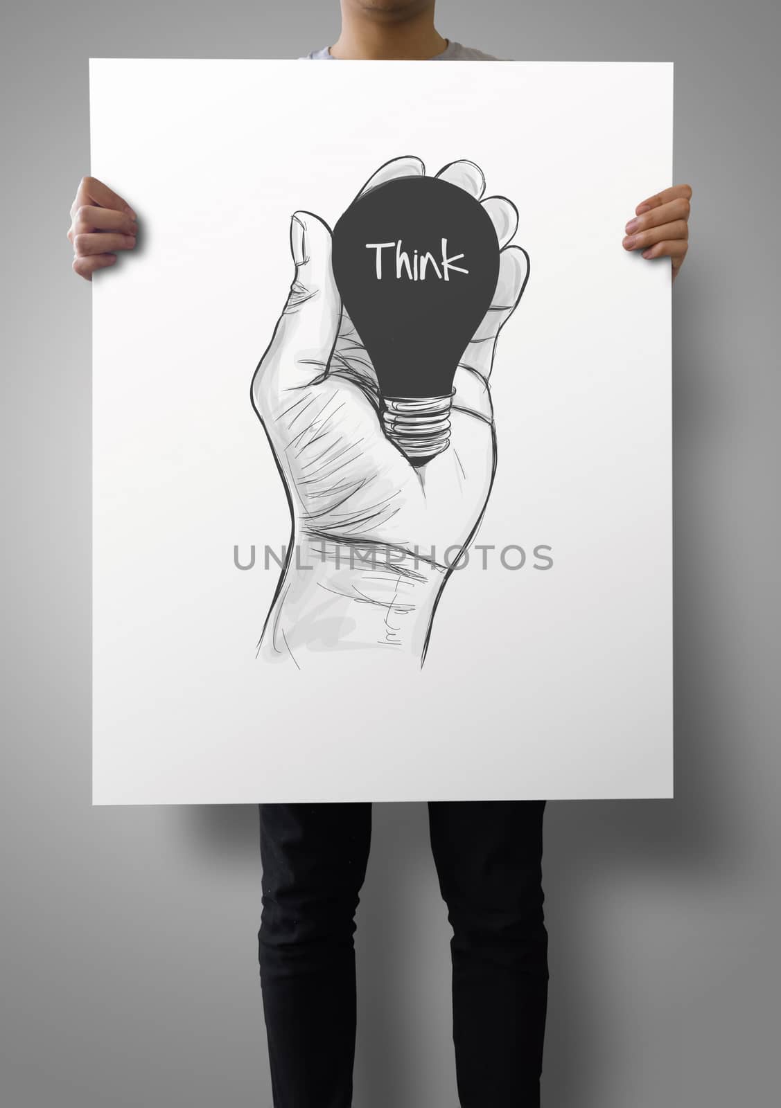 man showing poster of Hand drawn light bulb with THINK word on c by everythingpossible