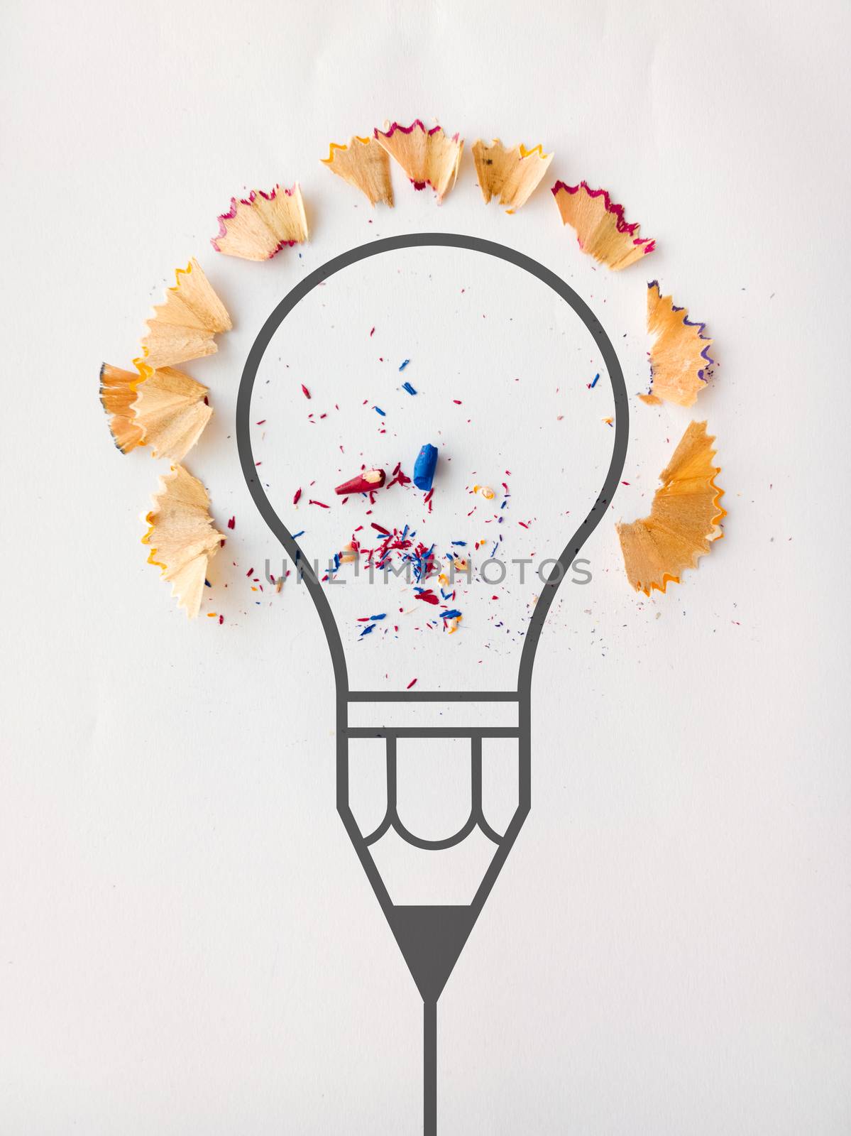 graphic pencil  light bulb with pencil saw dust on paper backgro by everythingpossible