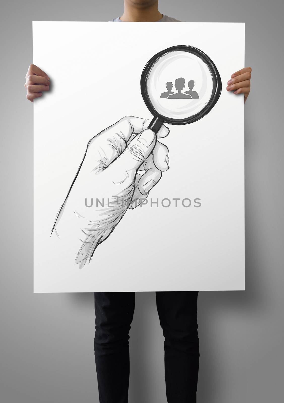 man showing poster of drawing of hand holding magnifier glass lo by everythingpossible